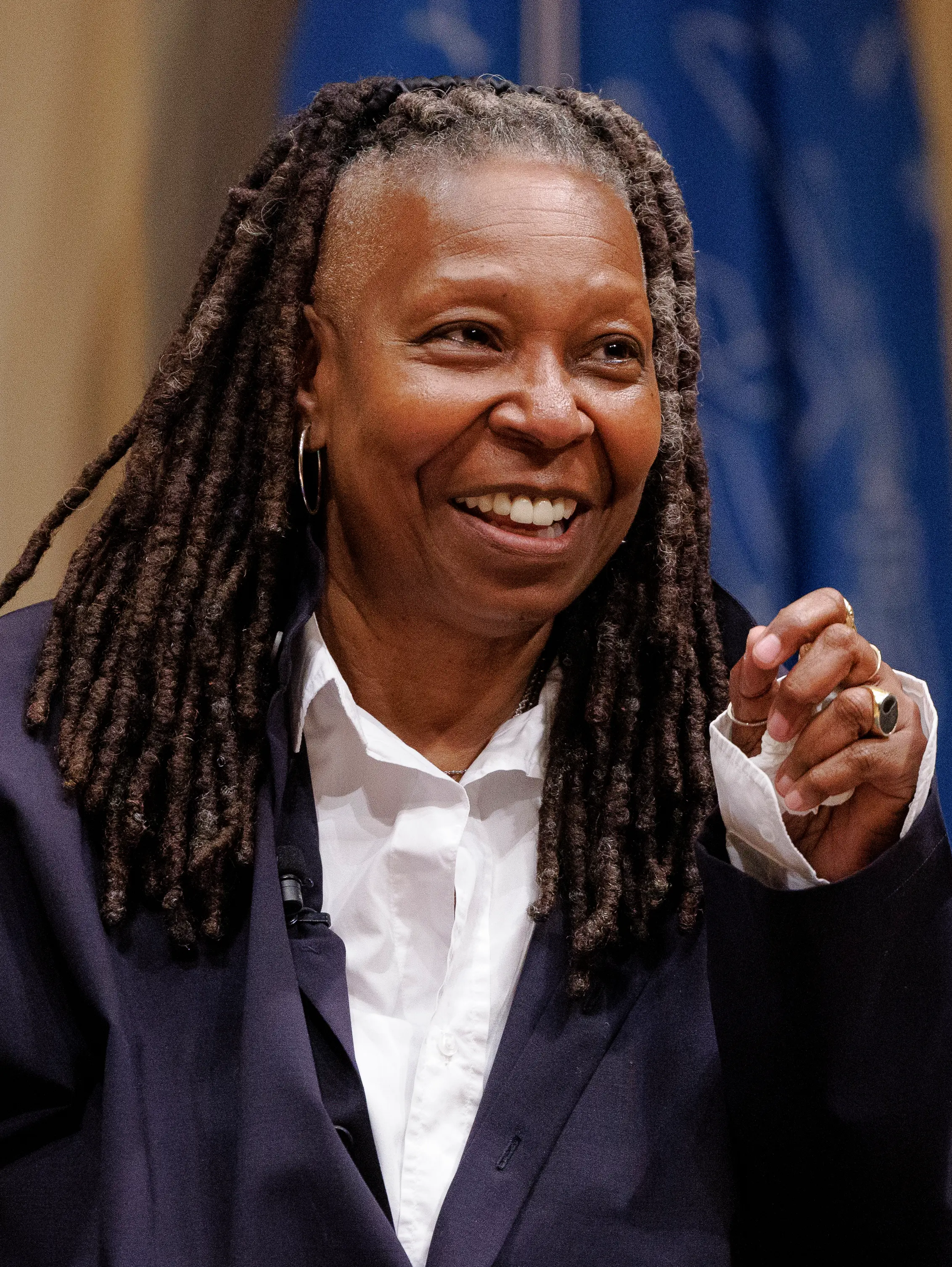 Whoopi Goldberg smiles for a portrait at the Library of Congress in 2024.