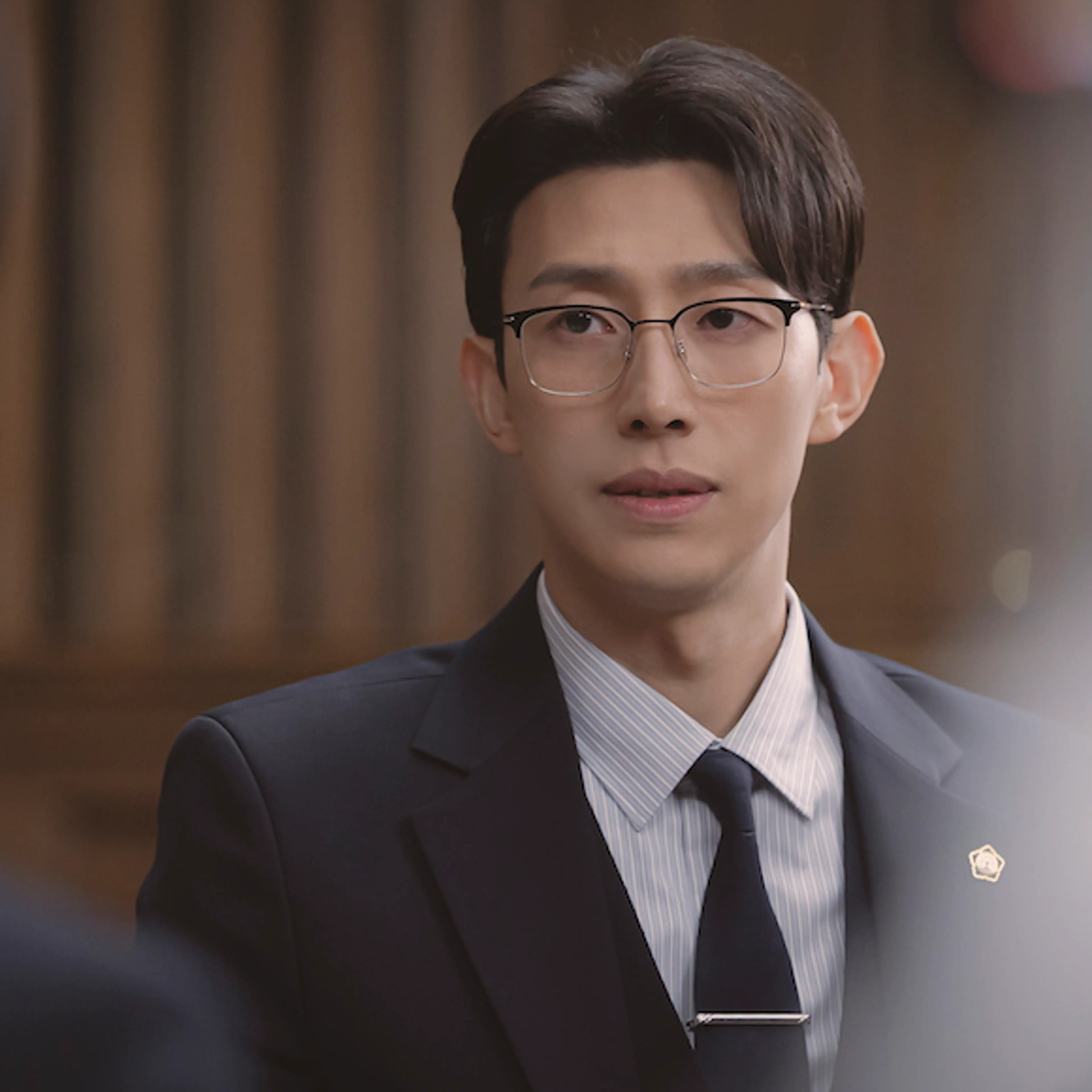 Kang Ki-young as Jung Myeong-seok in Extraordinary Attorney Woo.