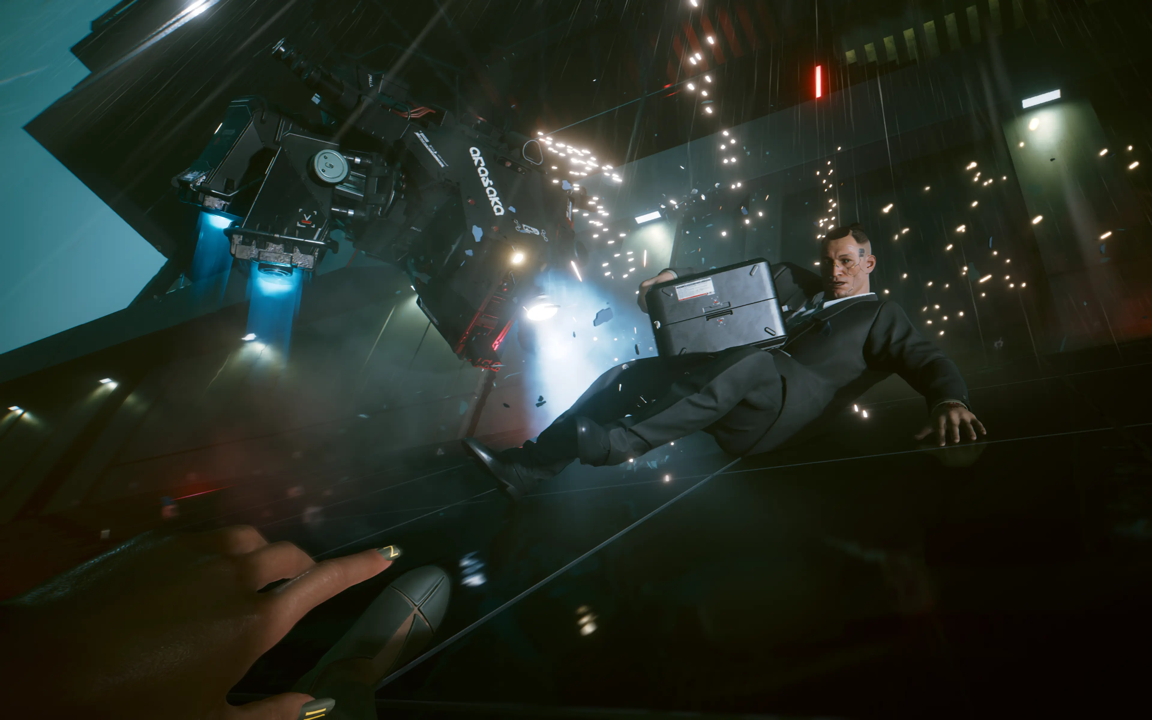 V blocks an attack with electrified Mantis Blades in a Cyberpunk 2077 street fight.