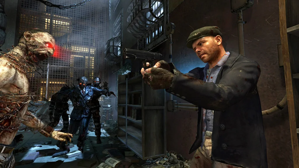 A mobster aims a pistol at zombies inside Alcatraz in Mob of the Dead.