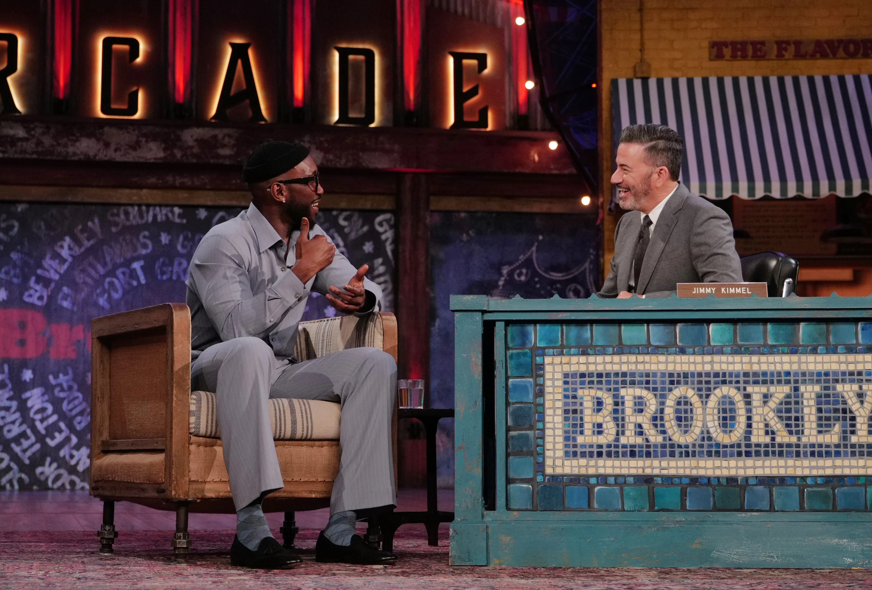 Mahershala Ali and Jimmy Kimmel smile during their September 30 interview.