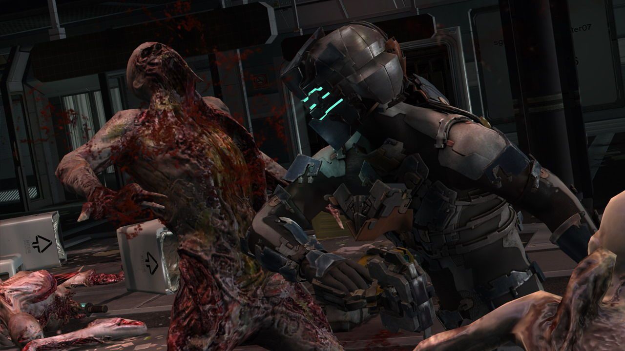 Isaac Clarke in a dark armored suit confronts a damaged humanoid Necromorph indoors.