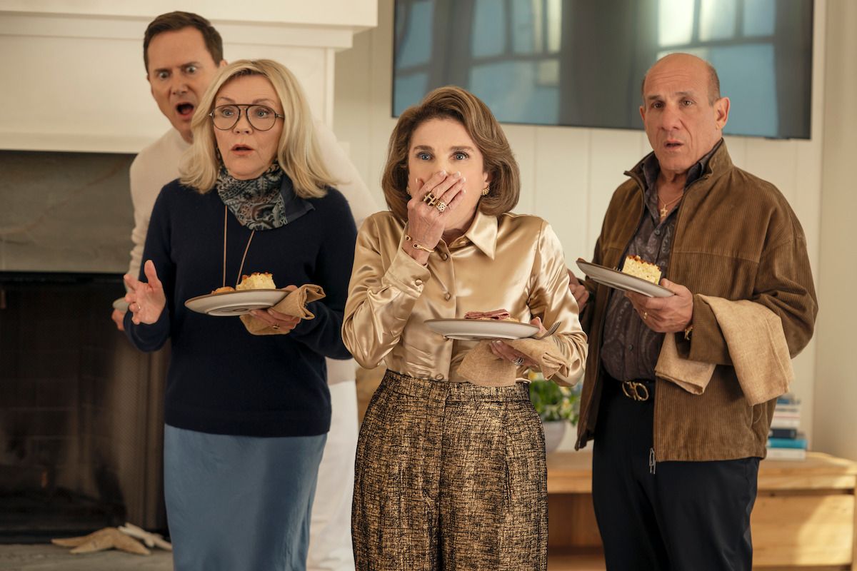 Sasha, Esther, Bina, and Ilan react with surprise inside a living room in Nobody Wants This Season 3.