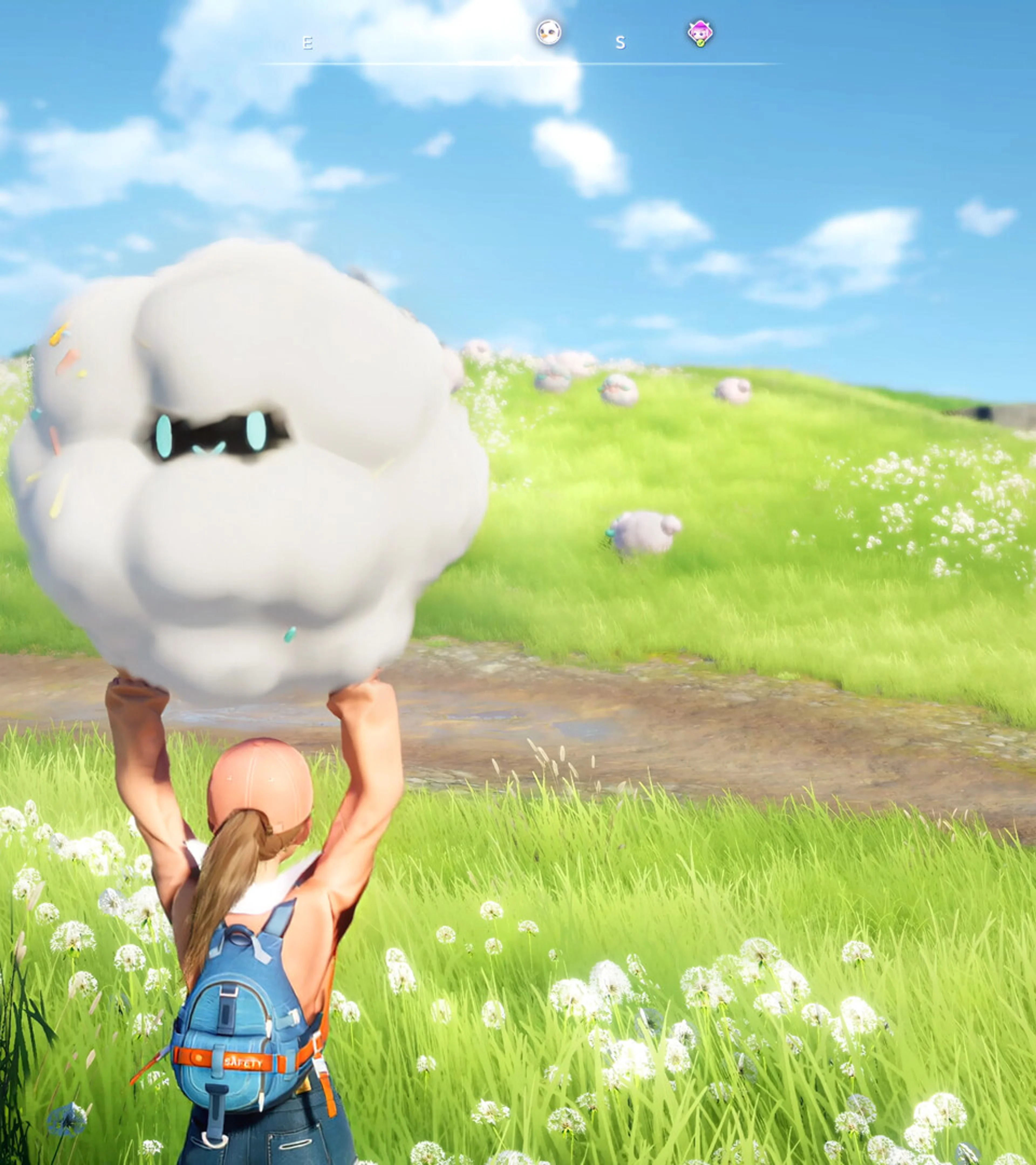 A Pathfinder holding a fluffy Aniimo in a flower-covered field.