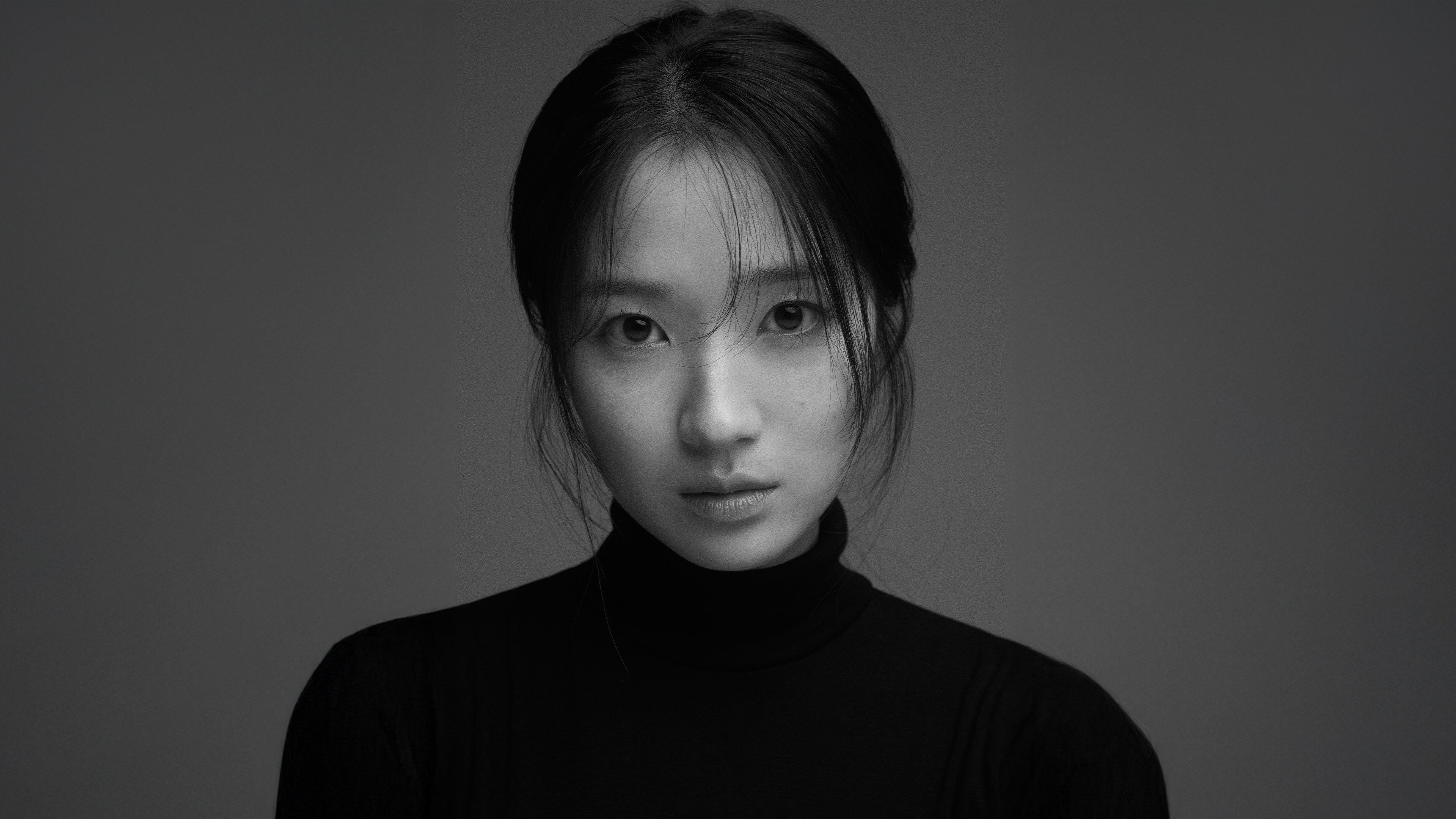 Kim Hye-yoon in a black-and-white portrait from her official agency profile.