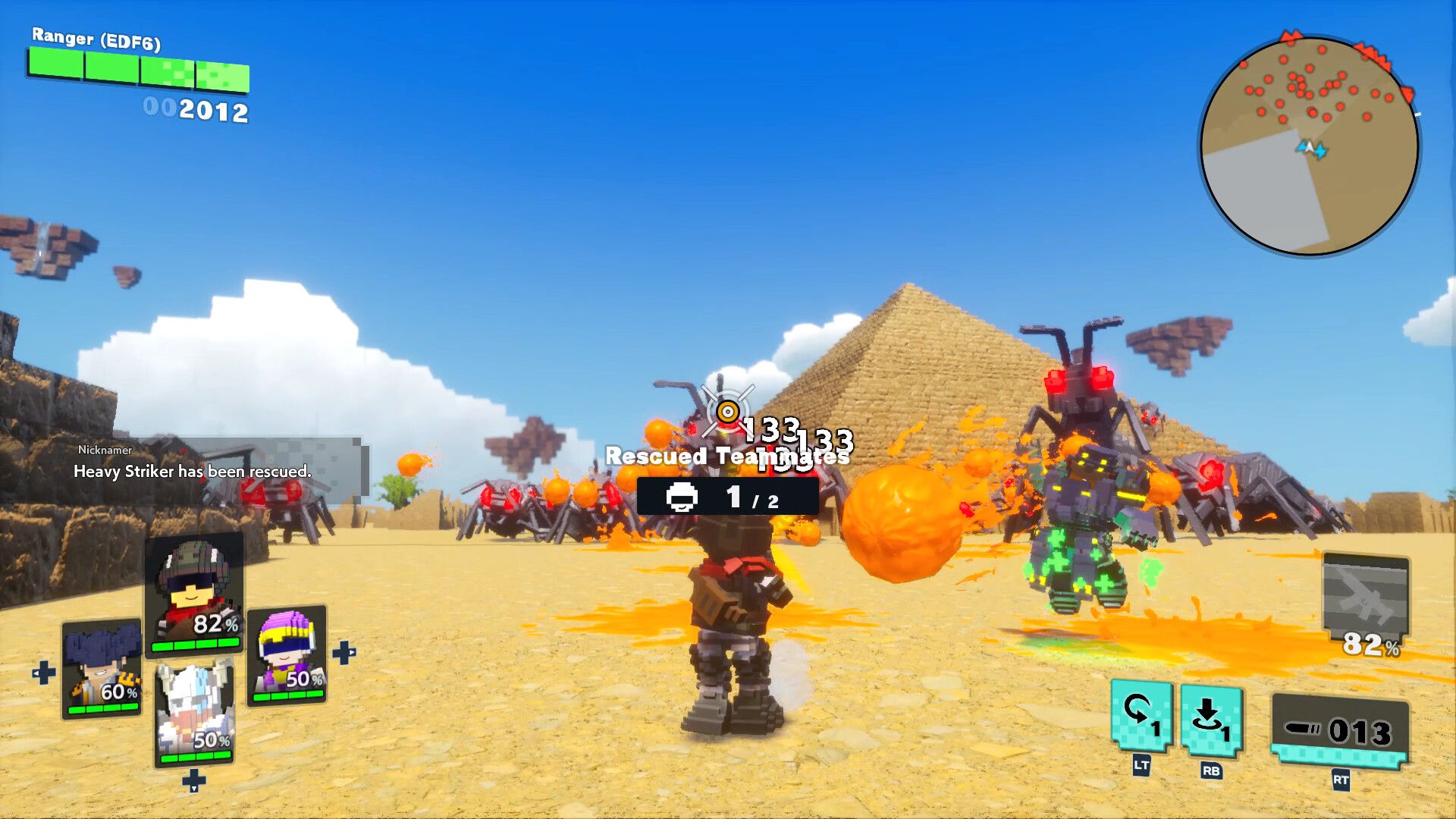 EDF soldiers fight giant insects near pyramids in World Brothers 2.