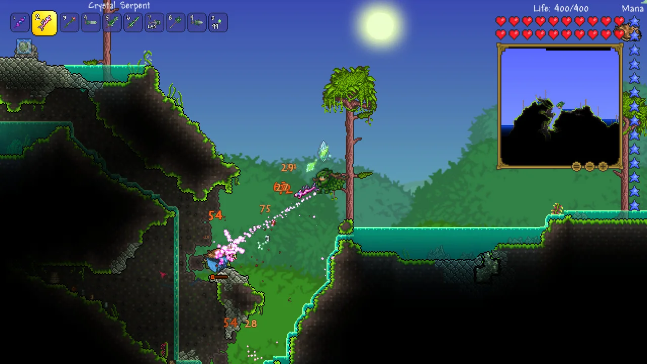 A Terraria player fights enemies in a green forest.