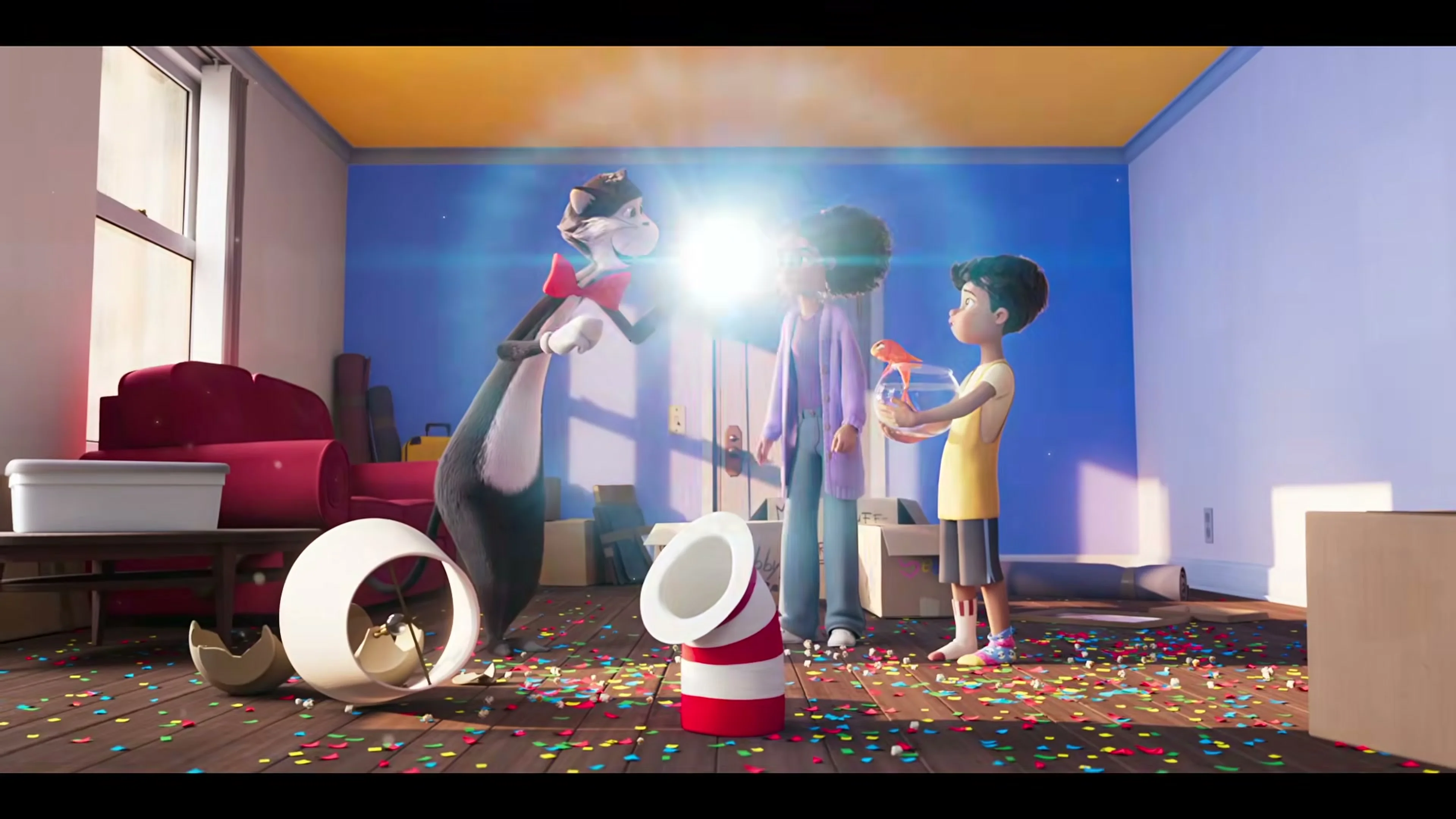 The Cat stands between Gabby and Sebastian as confetti fills their home in The Cat in the Hat main trailer.