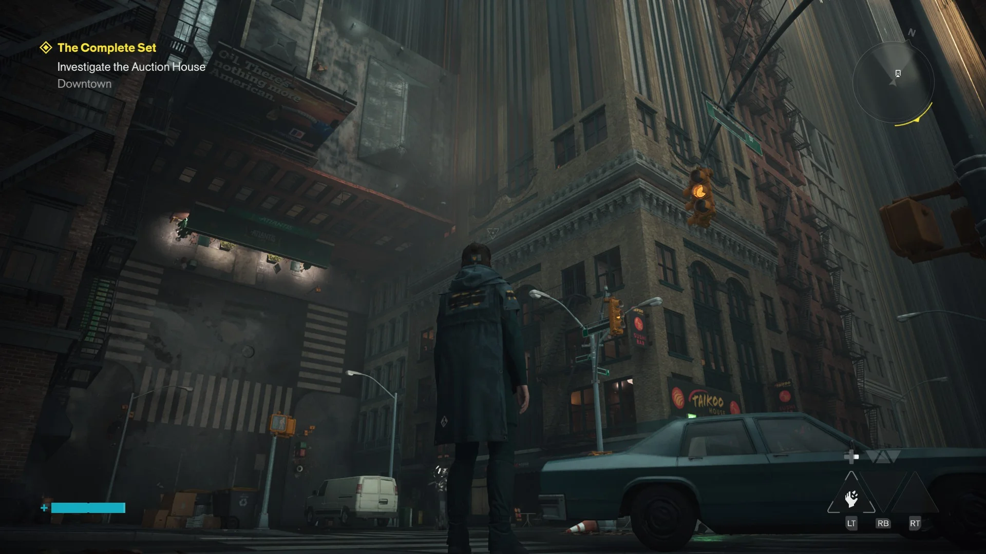 Dylan stands beside a car beneath a street that rises vertically between Manhattan buildings.