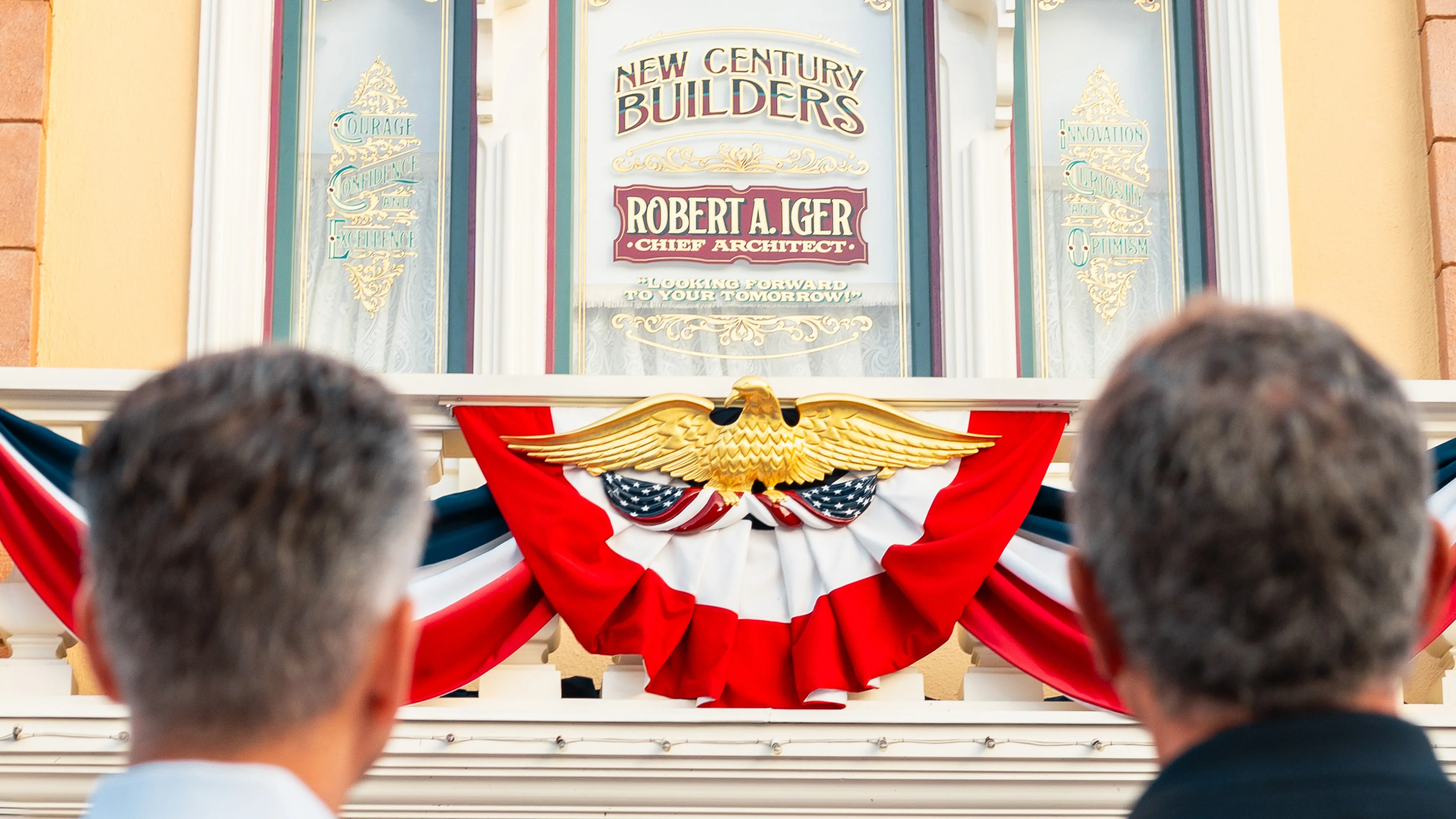 Bob Iger looks toward a Disney display bearing his name.