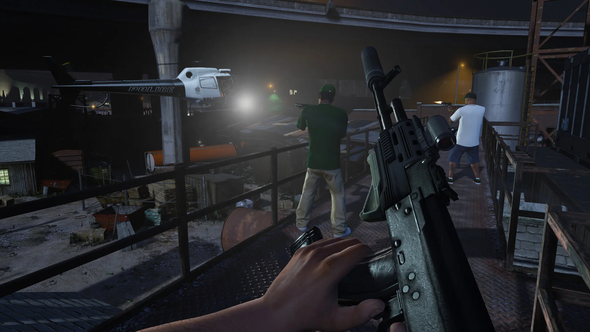 A GTA 5 crew fights police near a helicopter during a night mission.