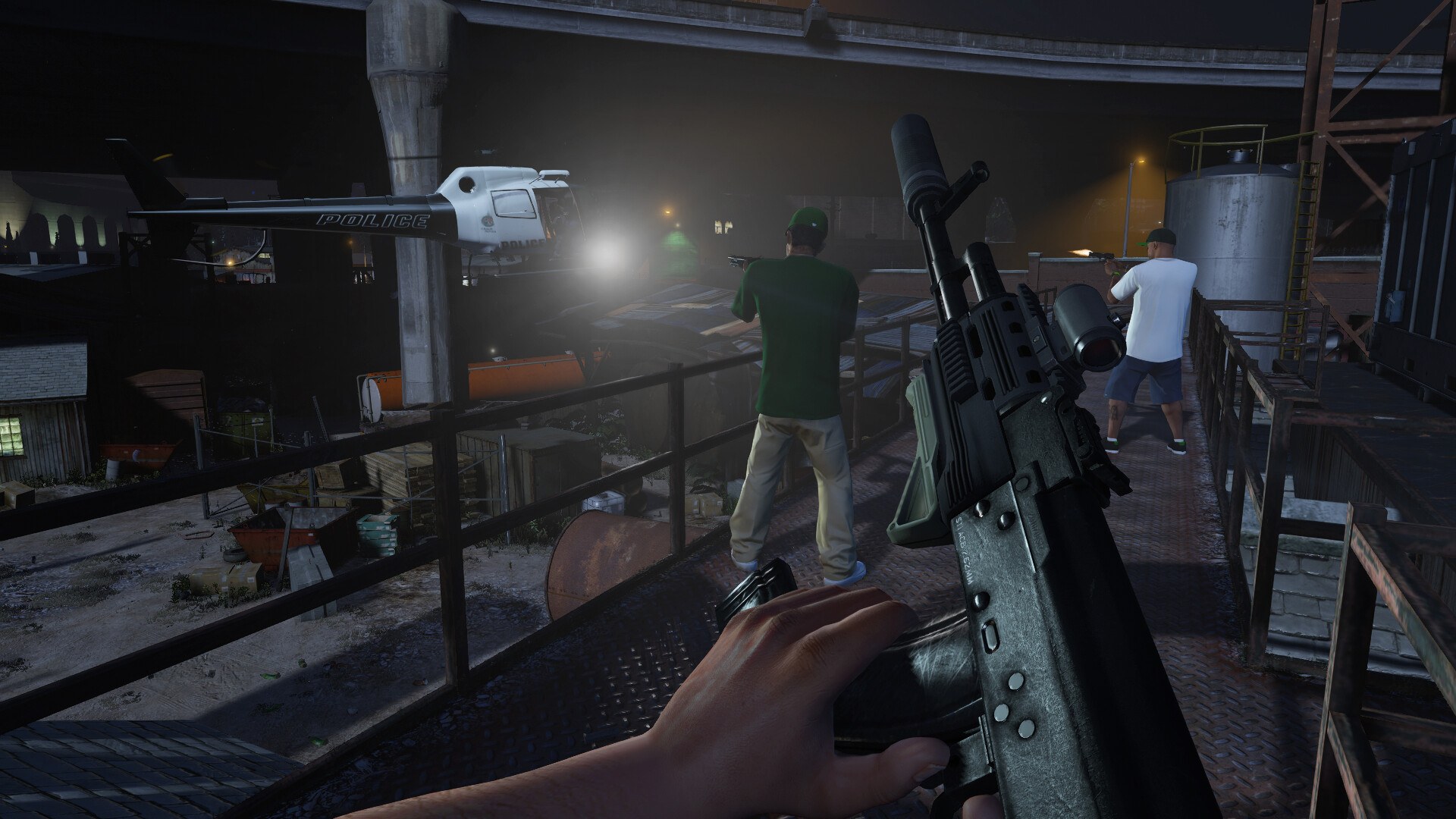 A GTA 5 crew fights police near a helicopter during a night mission.