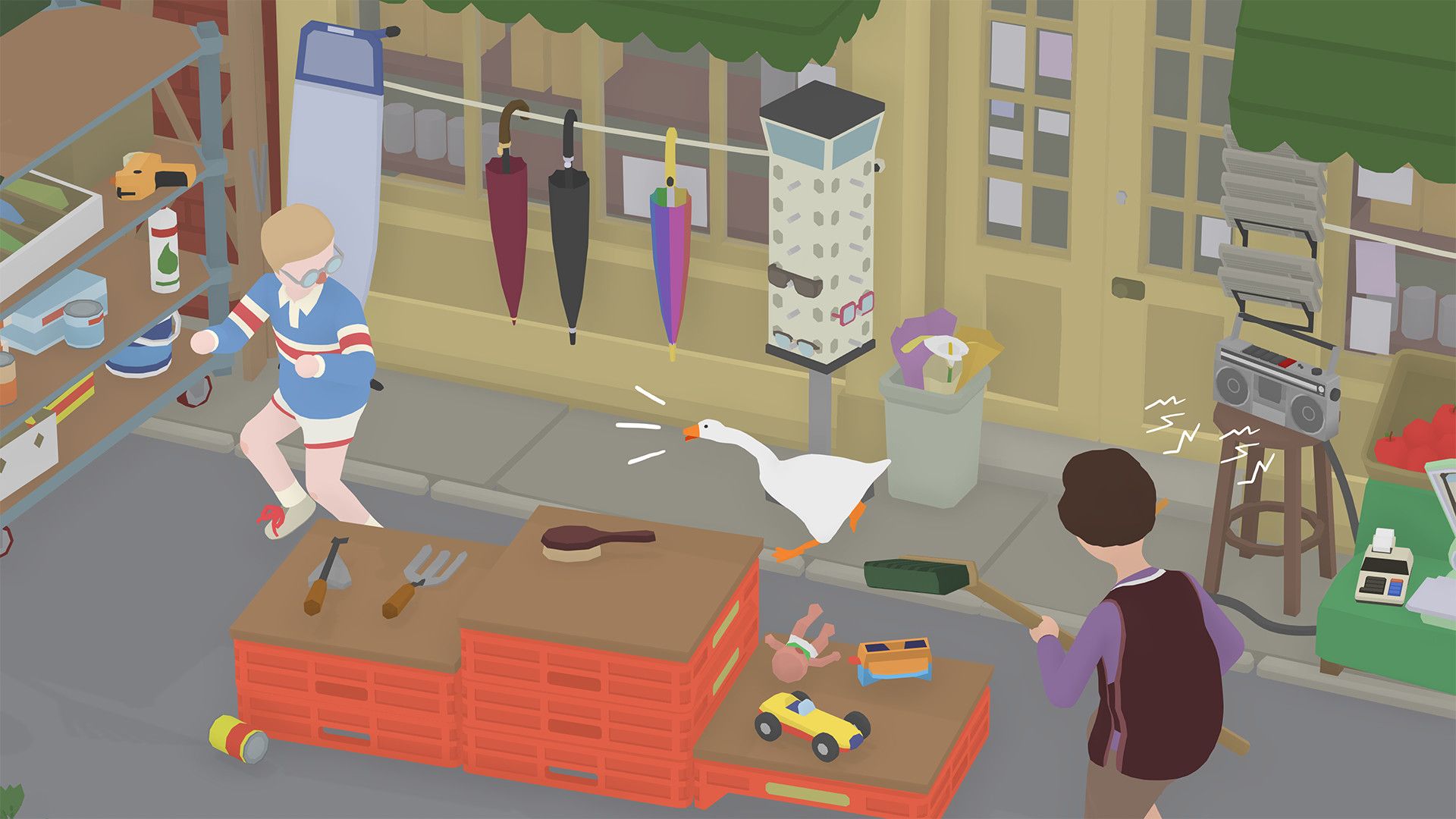 The goose honks between an open village shop and a market stall as two people react.
