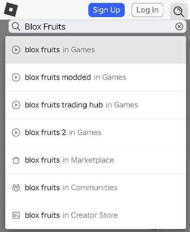 The Roblox search field contains Blox Fruits, with the exact blox fruits in Games suggestion above modified-game and Marketplace suggestions.