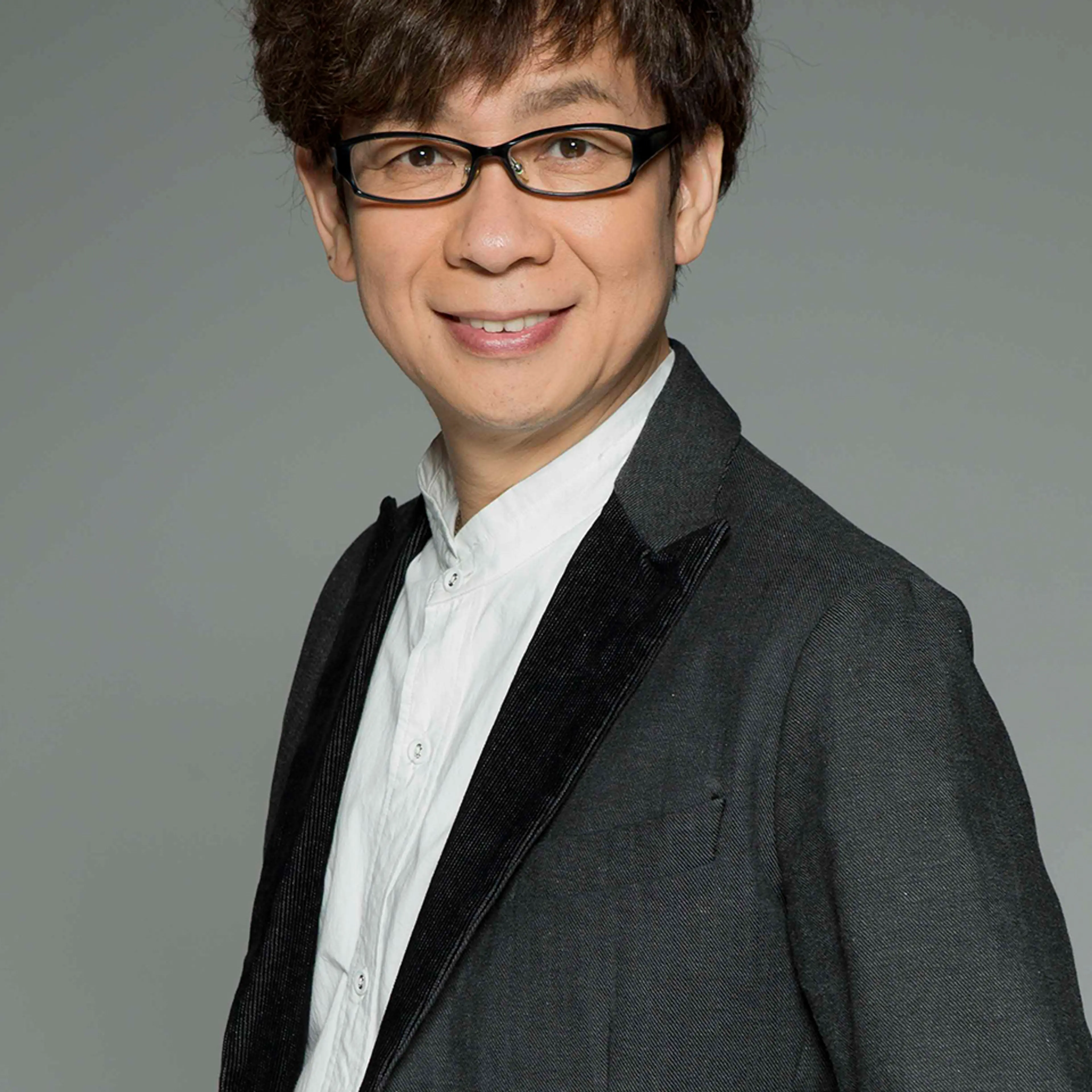 Japanese voice actor Koichi Yamadera in an official Across Entertainment portrait.
