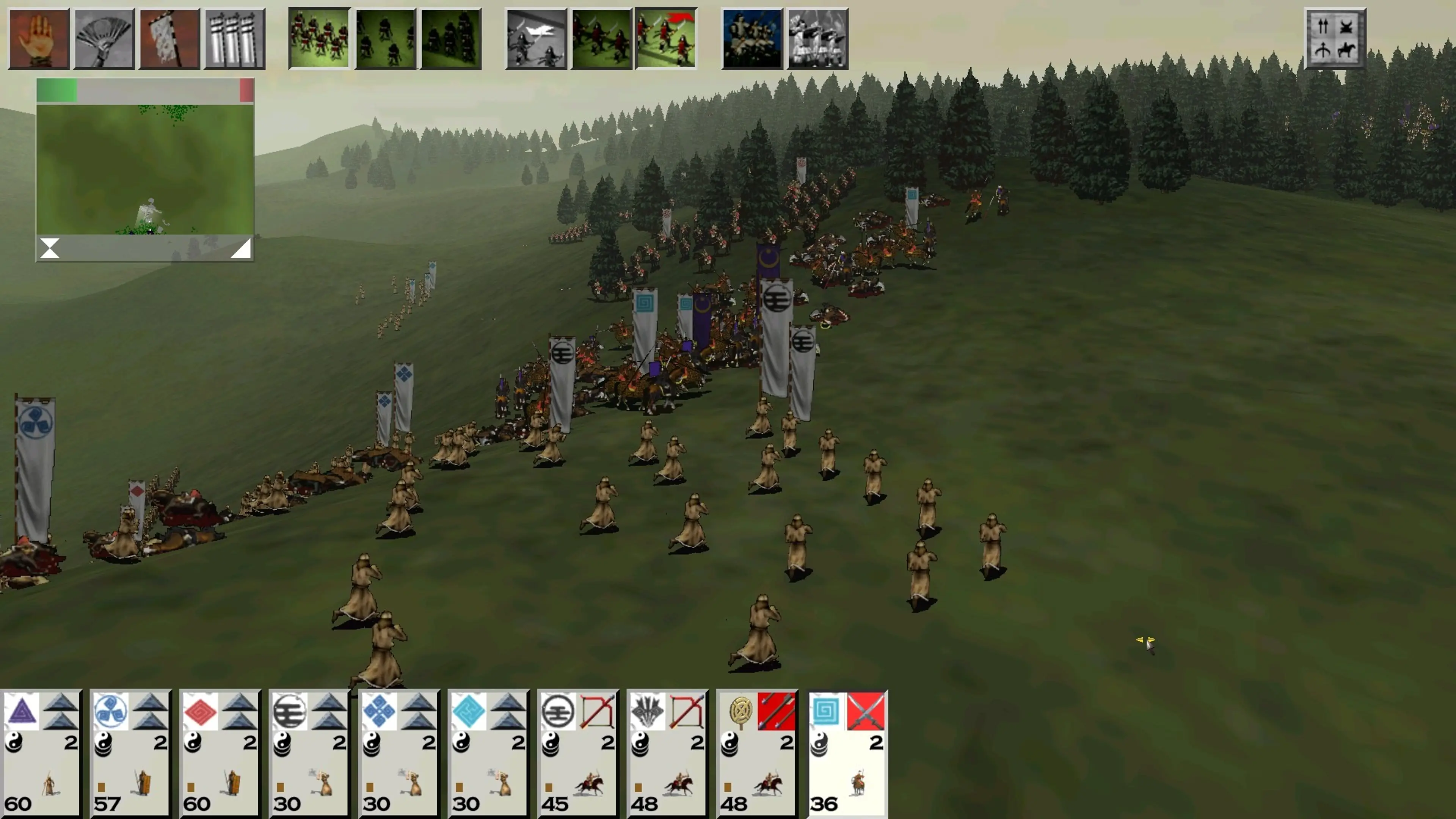 Troops maneuver near a forest in Shogun: Total War.