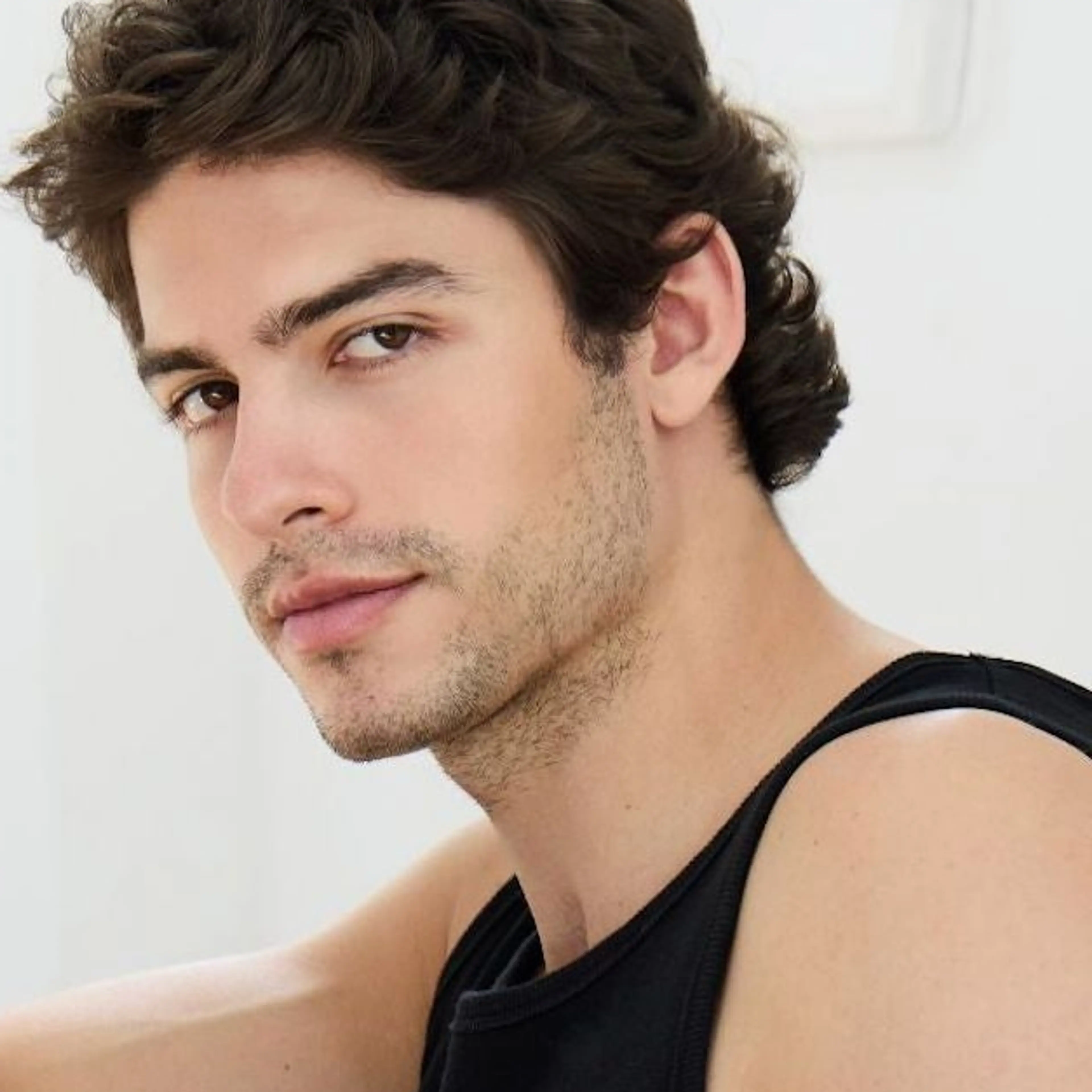 Connor Simos in a press portrait.