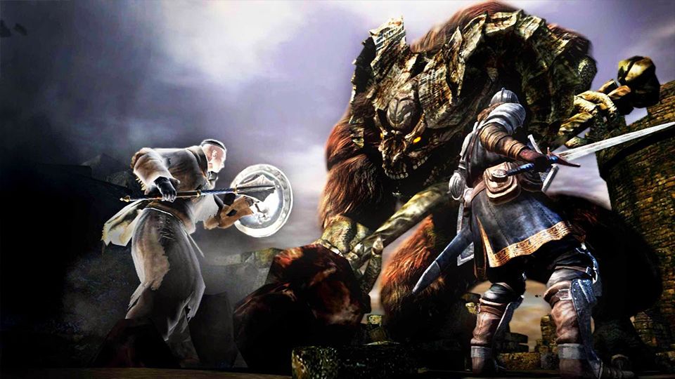 Two armored figures fight a huge horned demon in Dark Souls.