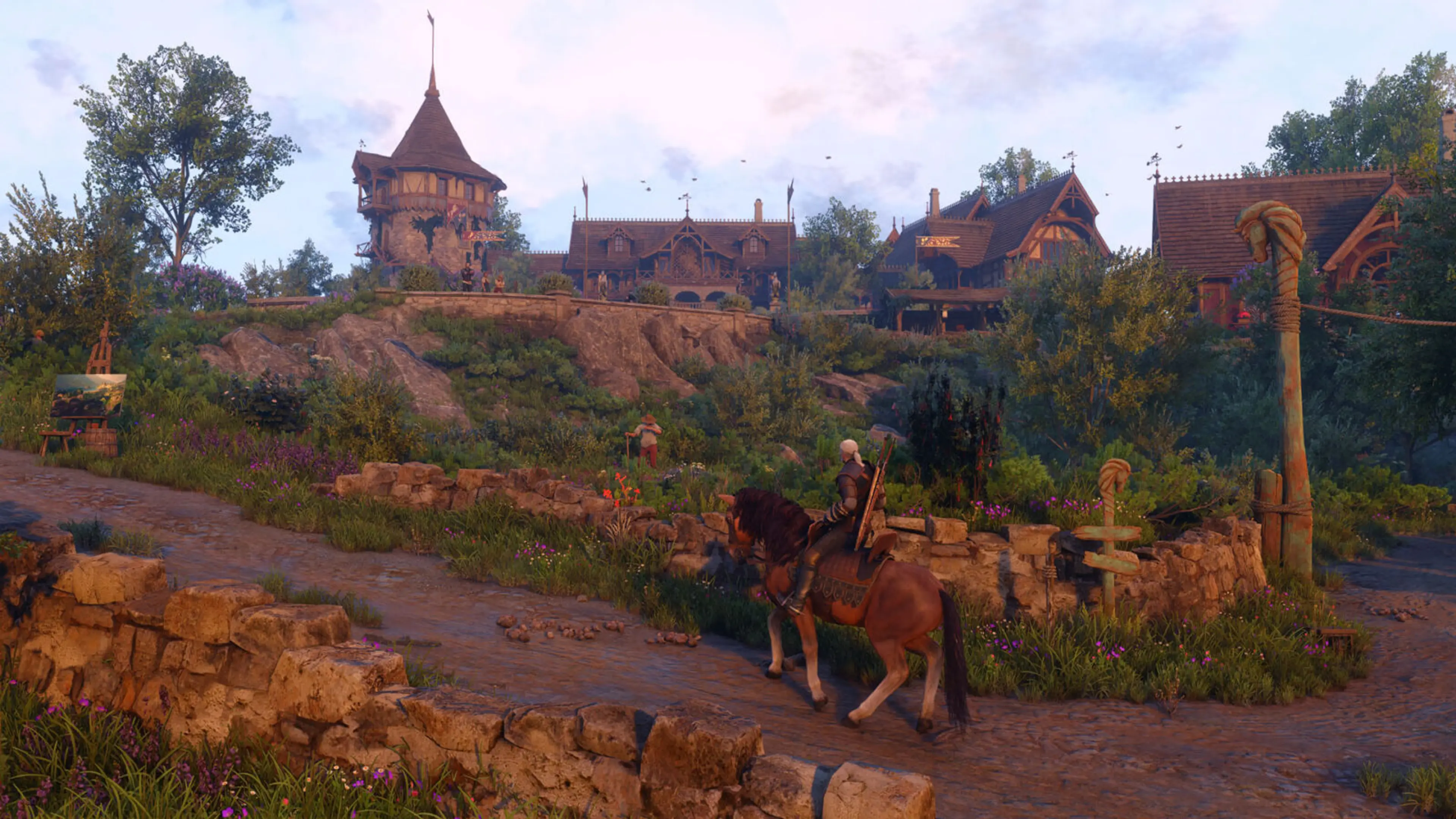 Geralt rides Roach toward the timber buildings and gardens of Letten in The Witcher 3: Songs of the Past.