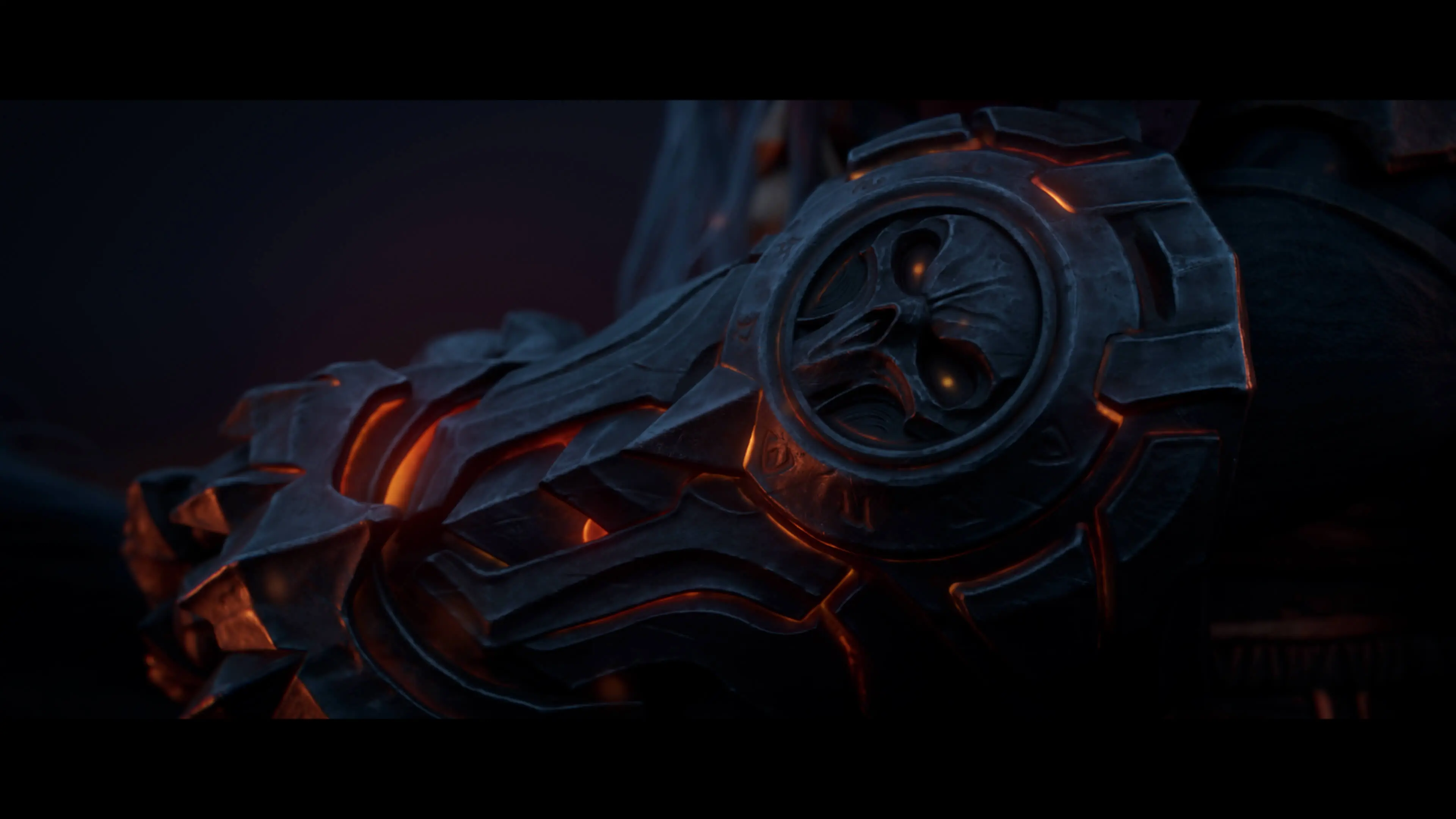 A close view of a Horseman’s armor glowing with orange light.