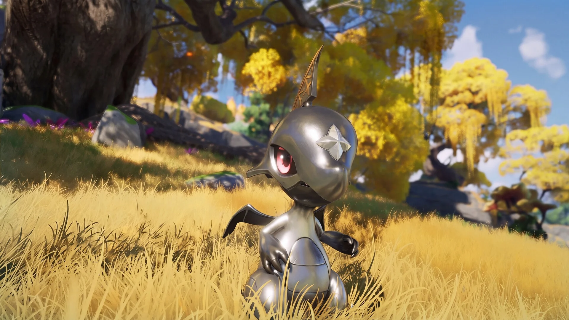 A small metallic Aniimo stands in a sunlit wooded area.