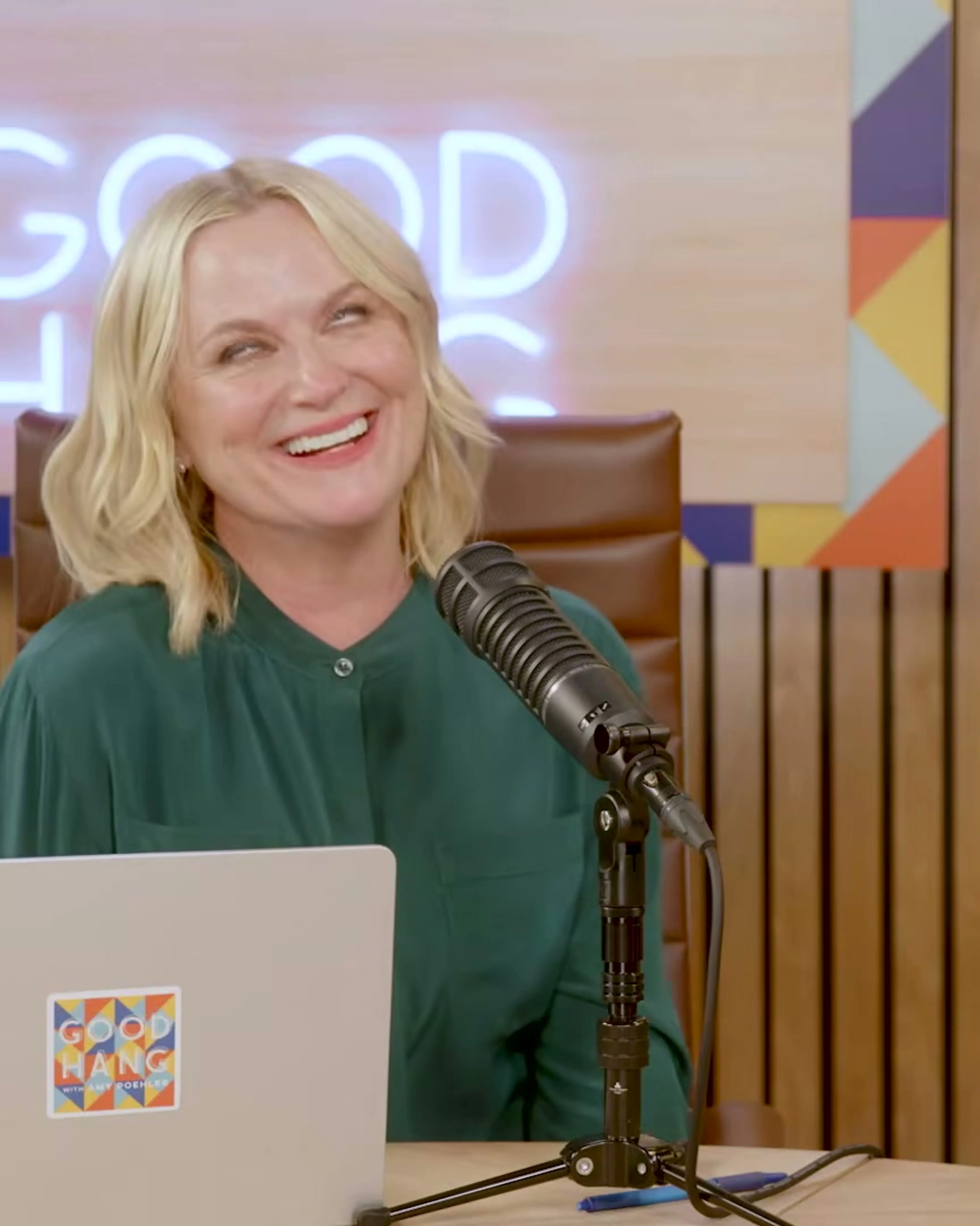 Amy Poehler smiles during her conversation with Andrew Garfield.
