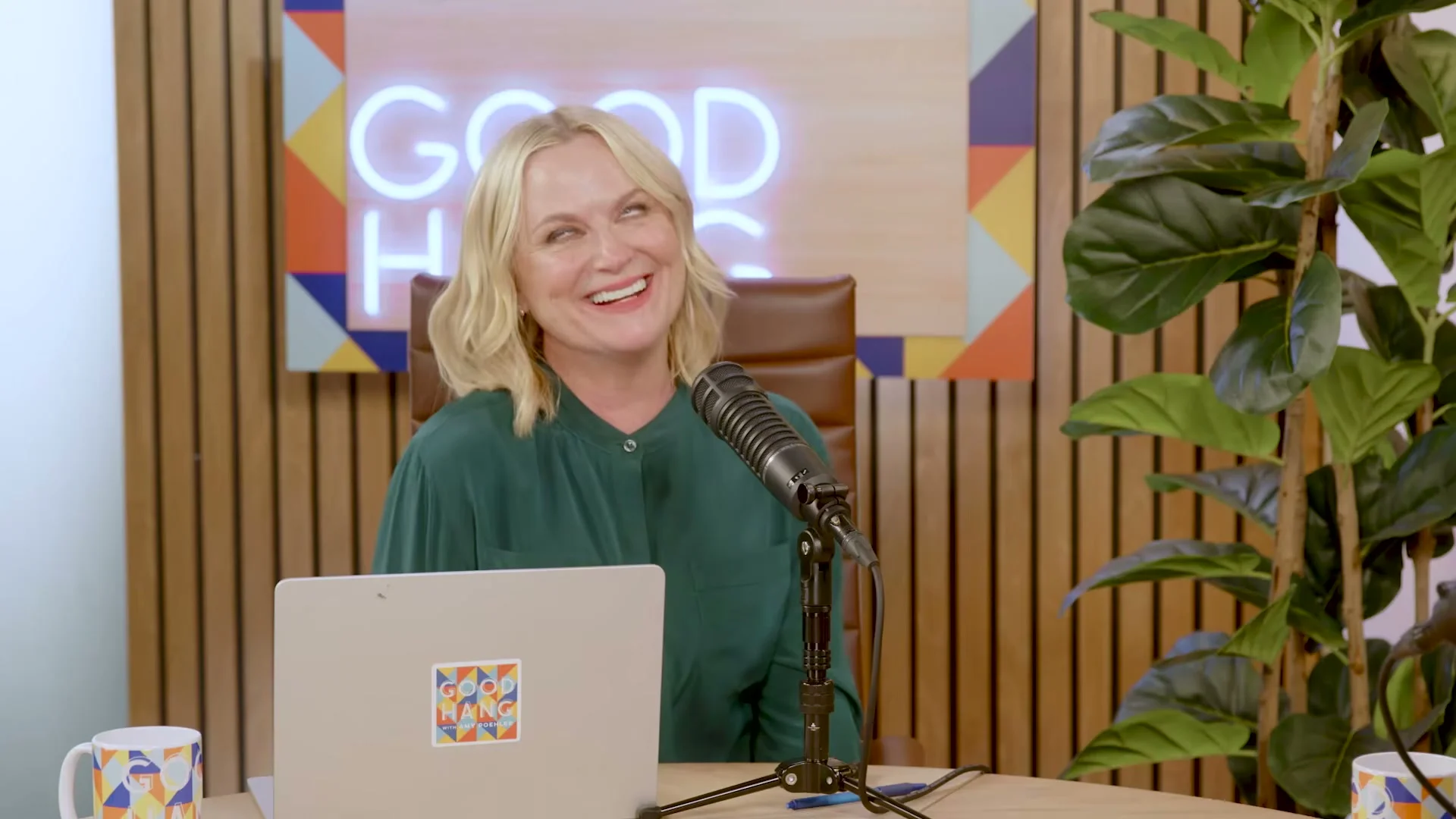 Amy Poehler smiles during her conversation with Andrew Garfield.