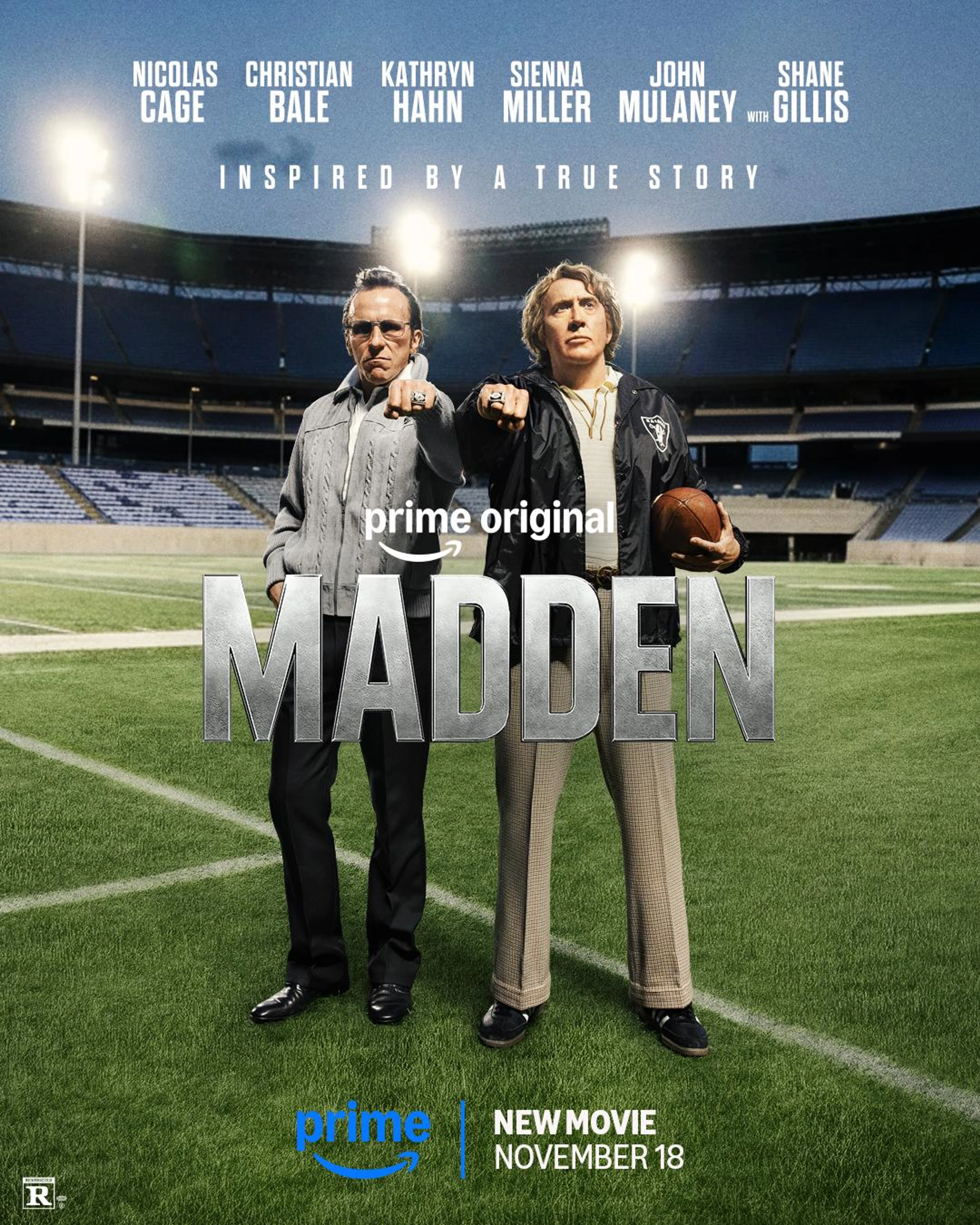 Official Madden movie poster with Christian Bale and Nicolas Cage on the Raiders field.