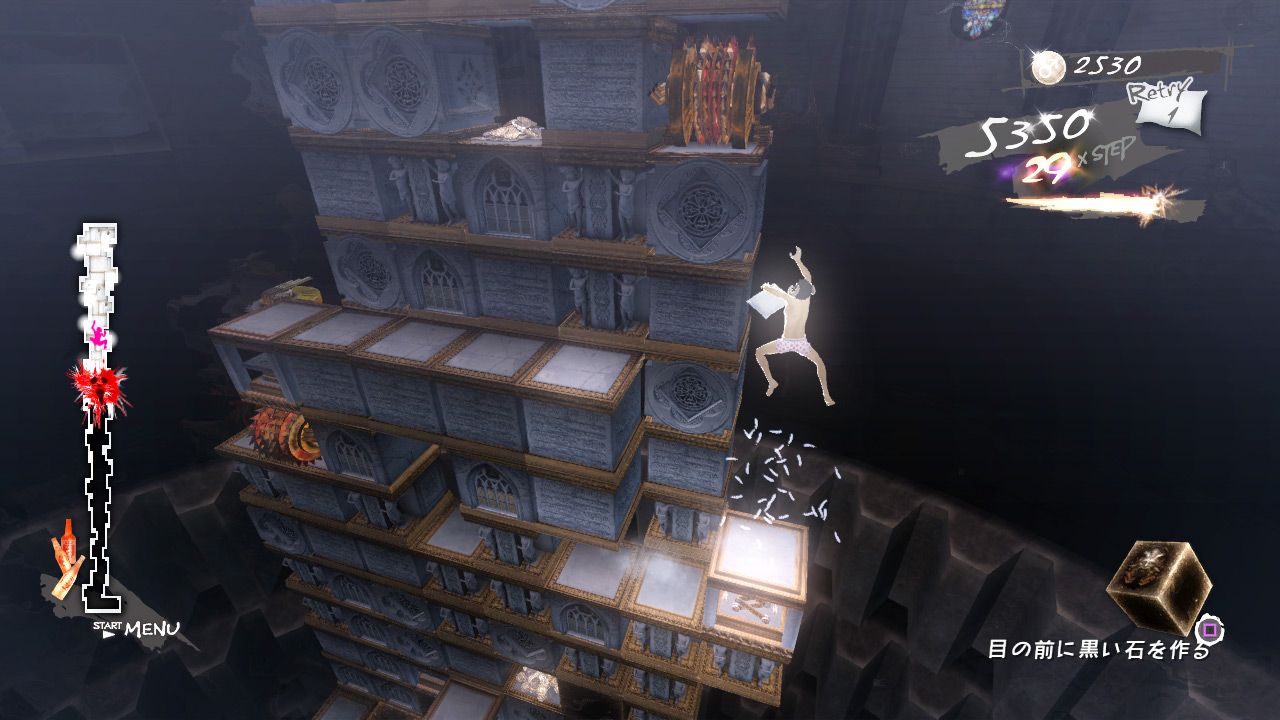 Vincent hanging beside a tall block tower, with climbing-stage information on screen.