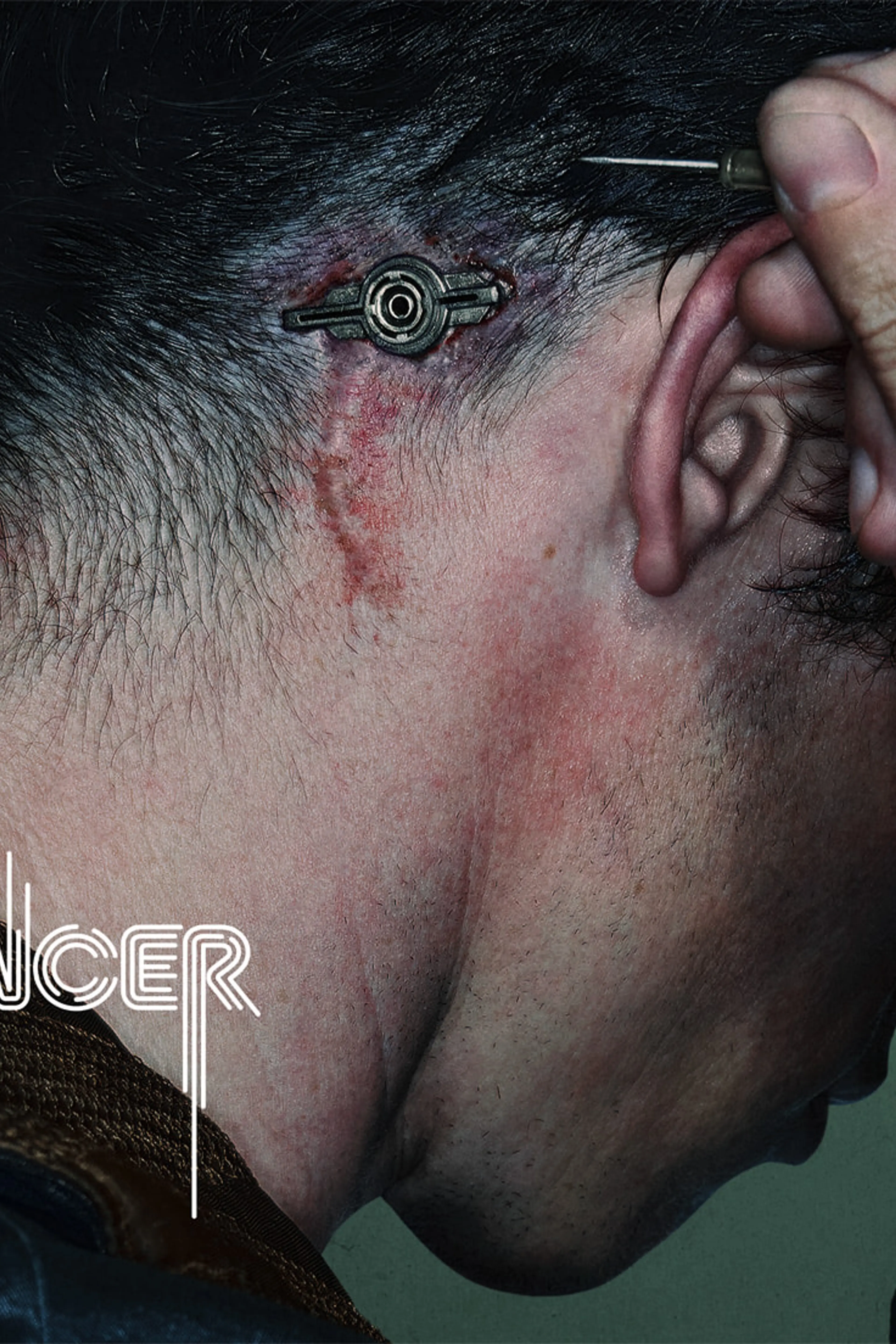 Callum Turner as Case connects a cable behind his ear in official Neuromancer key art.