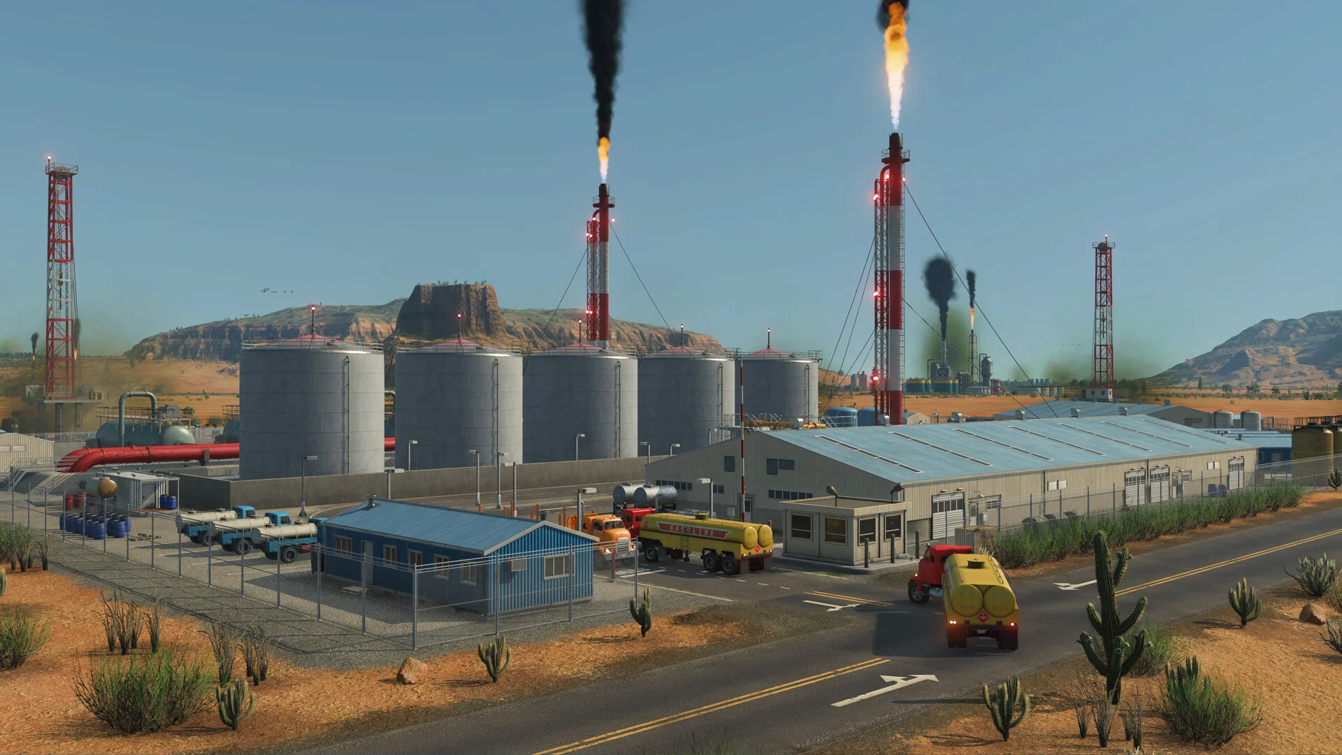 Trucks move through an industrial site in a desert Transport Fever 3 map.