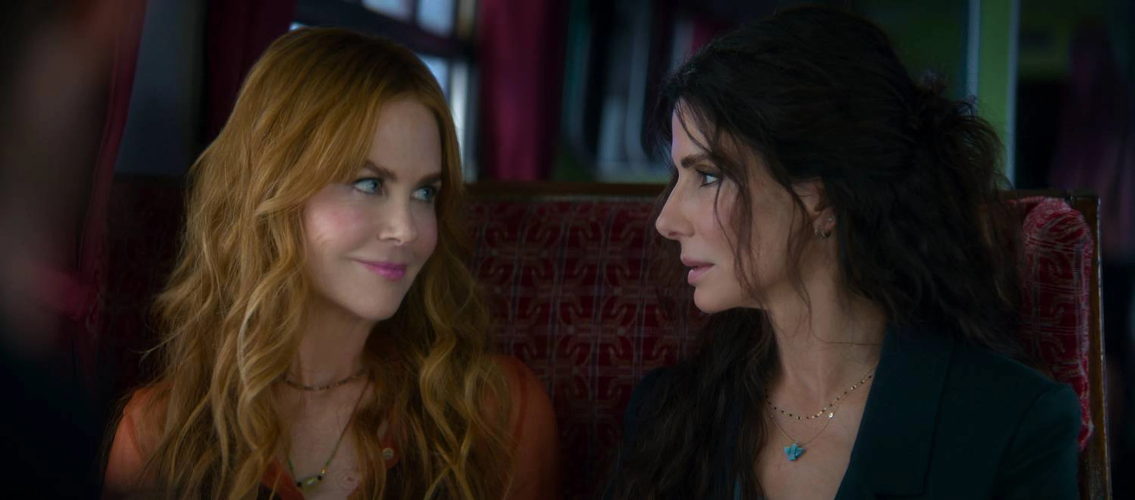 Sandra Bullock and Nicole Kidman stand together as Sally and Gillian Owens in Practical Magic 2.