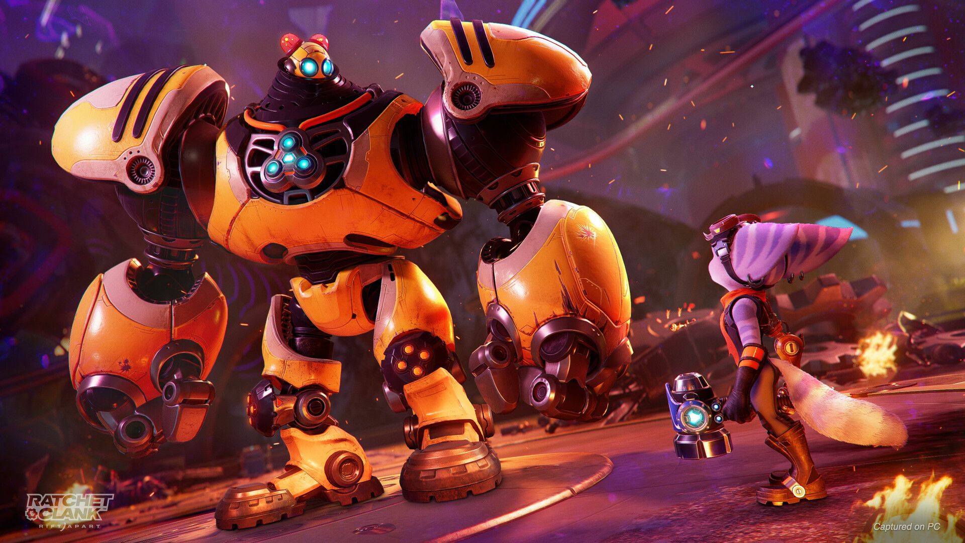 Ratchet faces a much larger robot in a burning city. Official PC image.