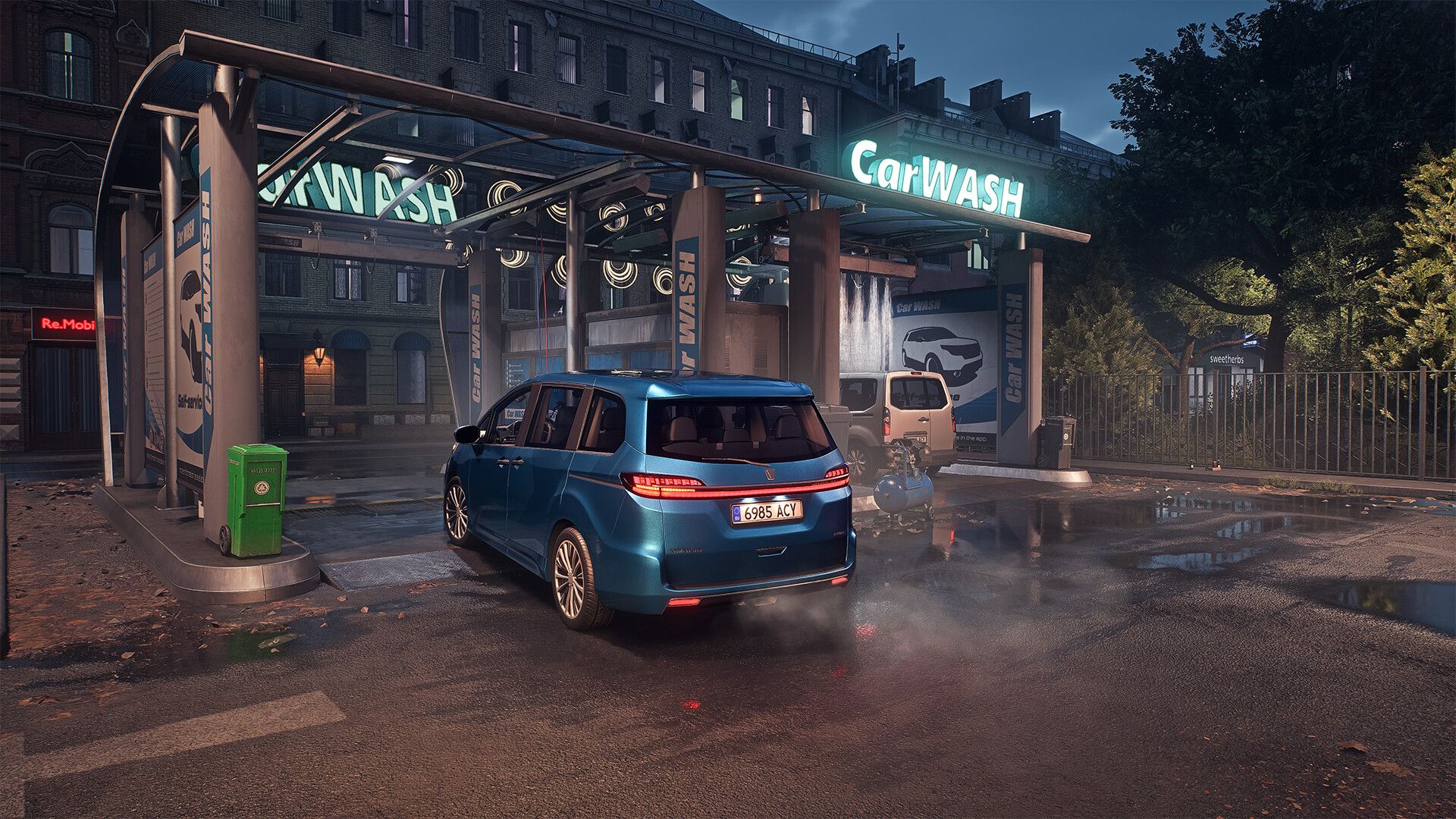 A blue minivan sits at a brightly lit car wash on a wet city street in Rideshare "Stimulator".