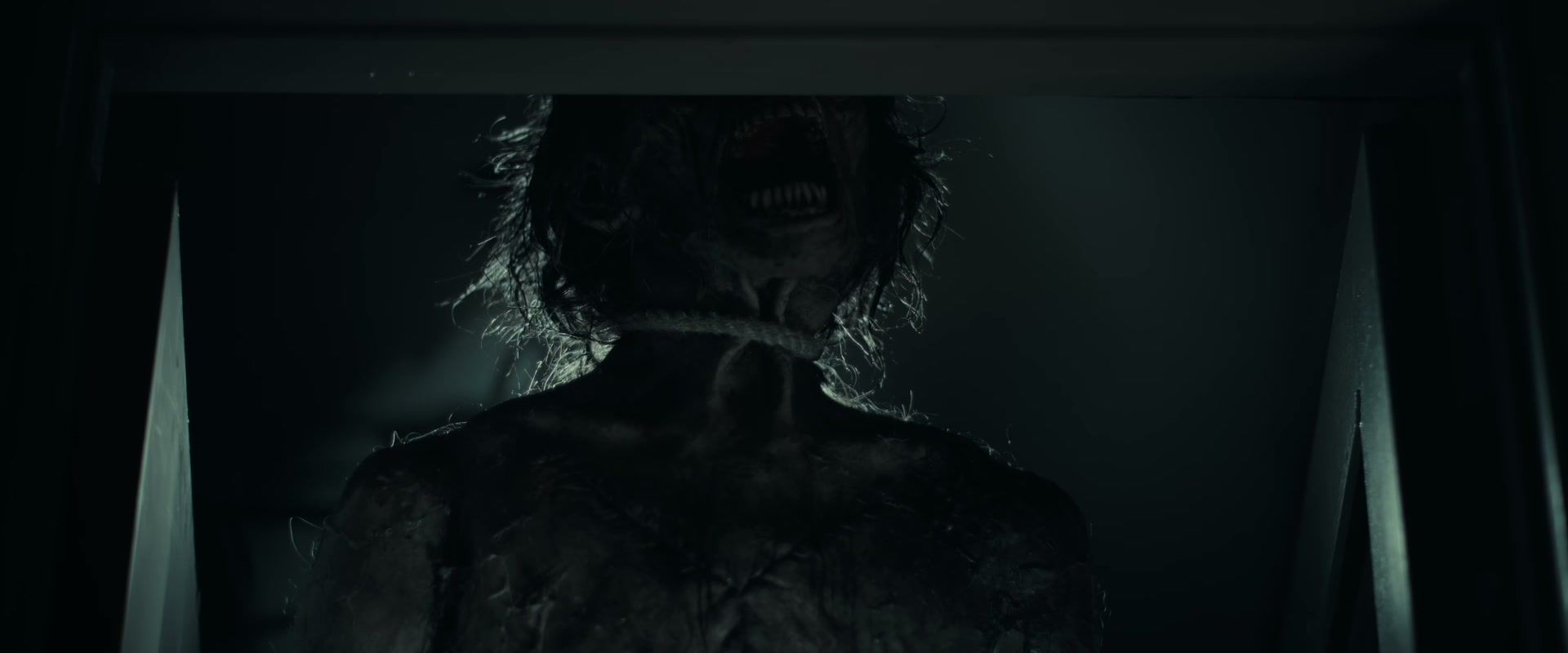 A strange figure appears behind a doorway in The Cycle trailer.
