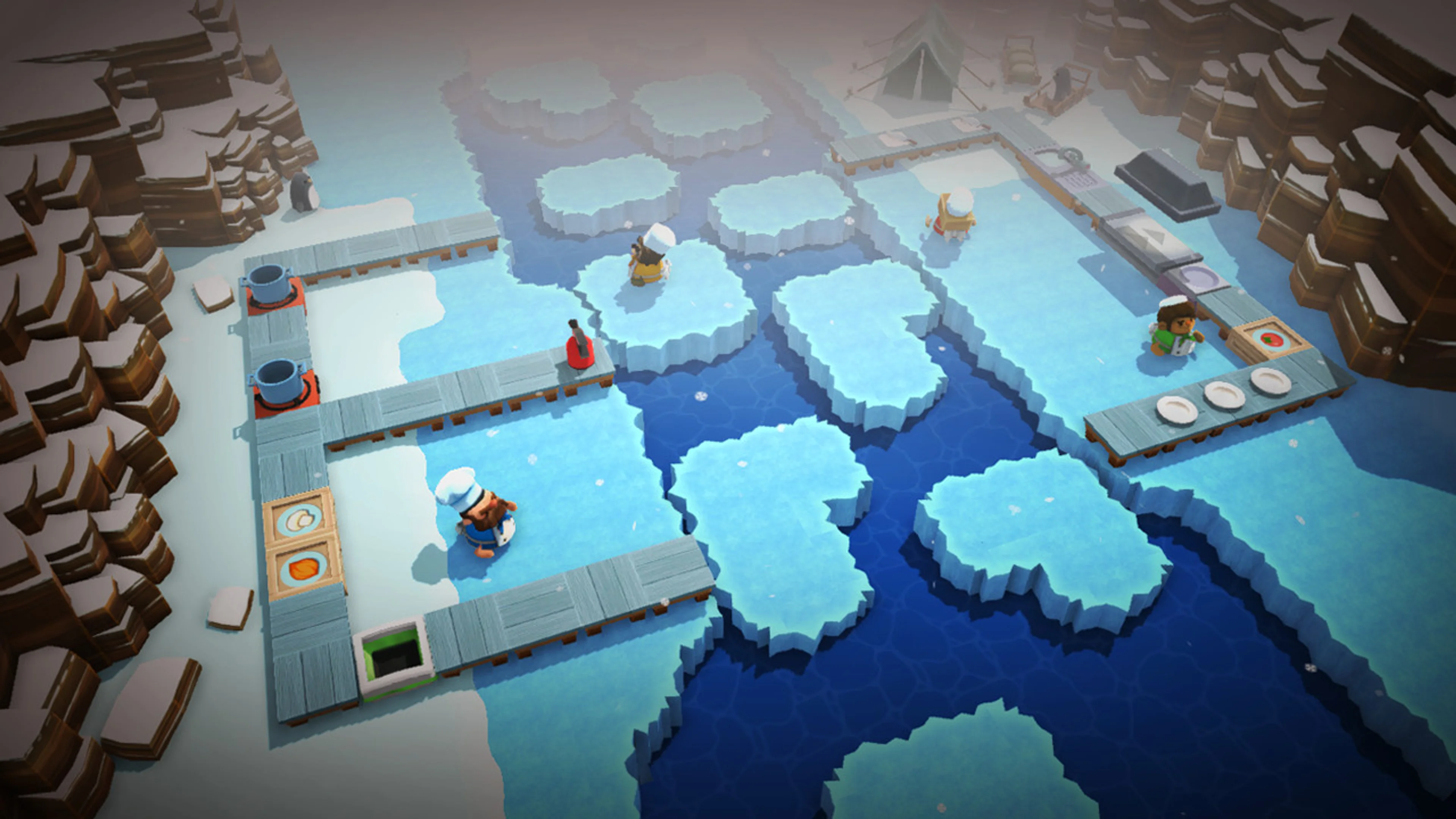 Overcooked chefs cook on small platforms separated by ice and water.