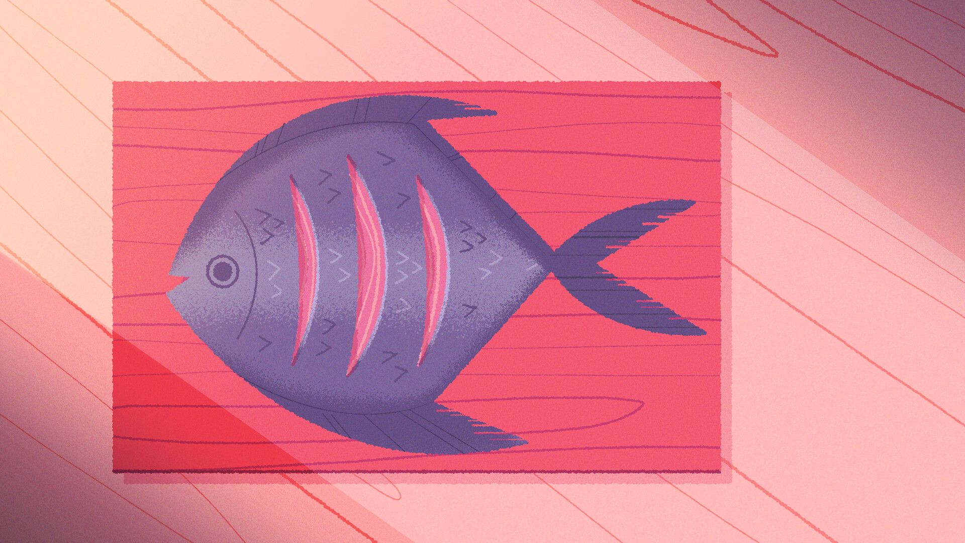 A whole fish with cuts along its side lies on a red preparation board.