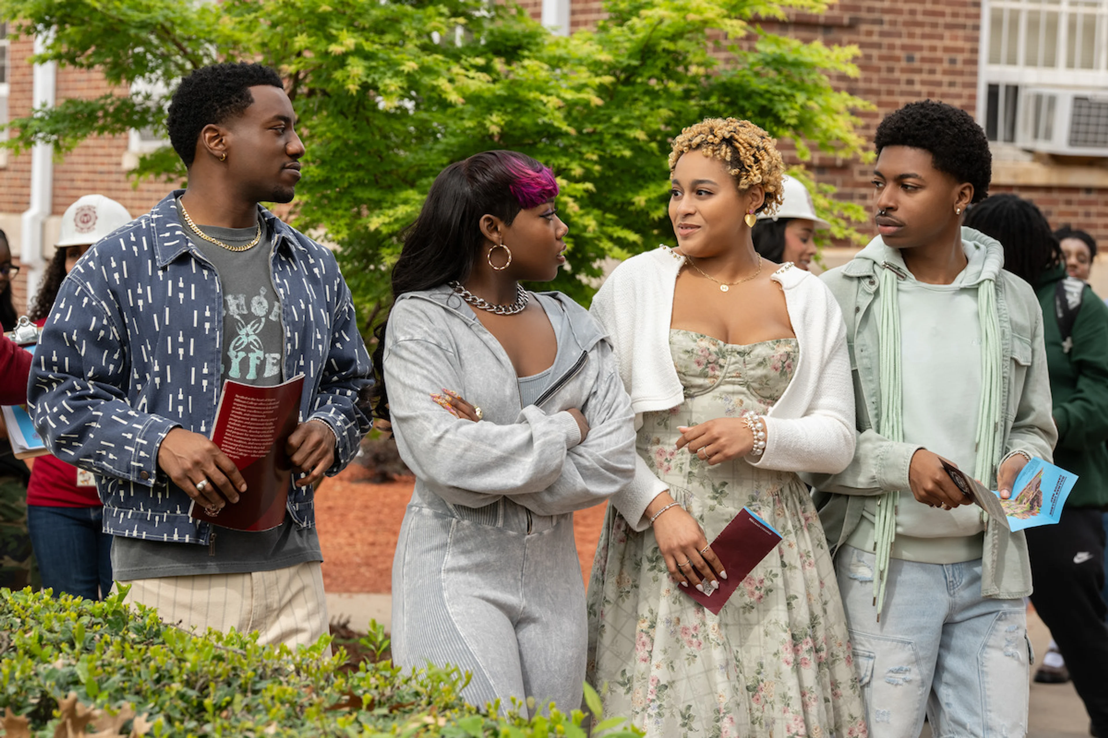 Deborah and her new classmates walk across the Hillman College campus in an official A Different World: The Legacy Continues still.