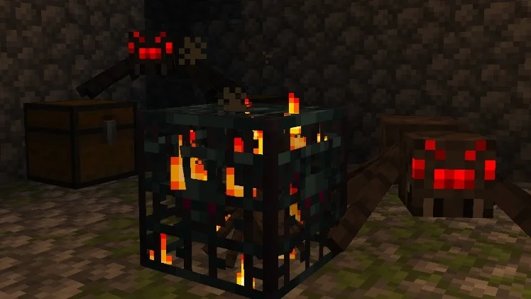 A Minecraft monster spawner inside a cobblestone room with spiders nearby.