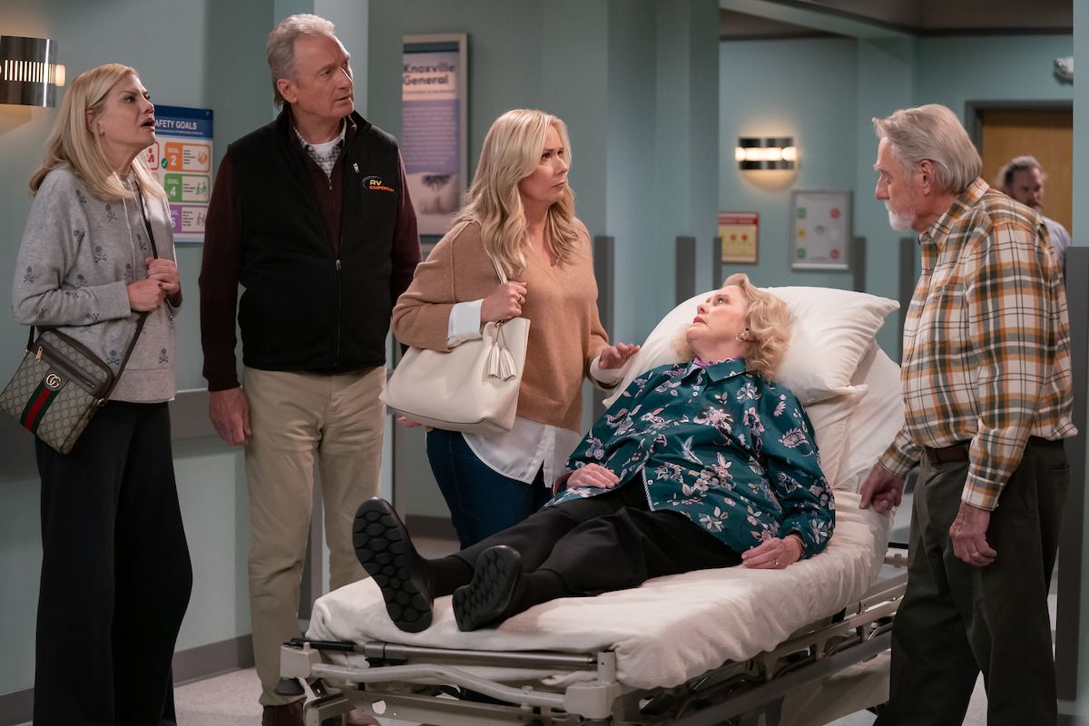 Carol, Bill, Leanne and Daddy John gather around Mama Margaret in a hospital room in Leanne.
