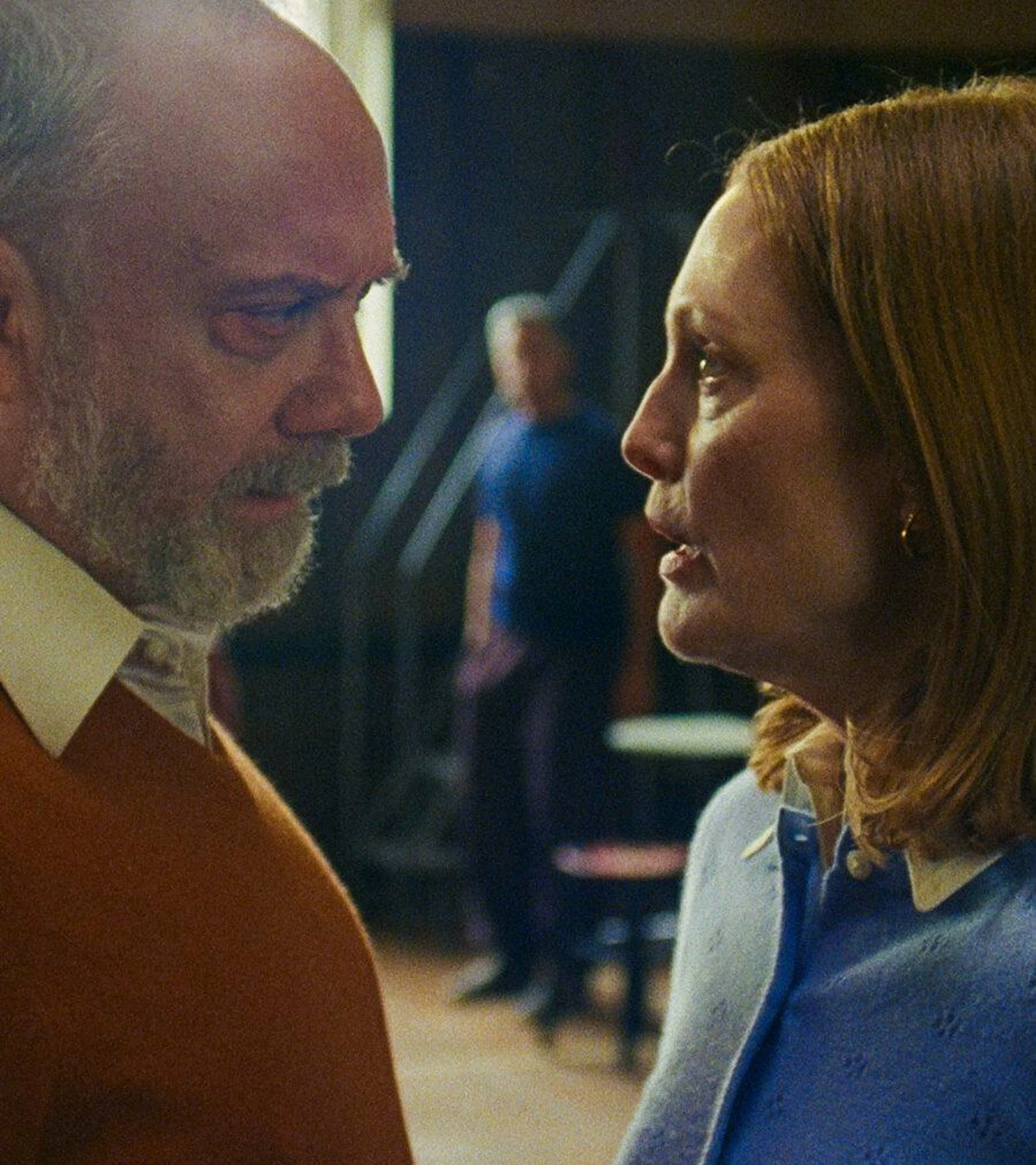 Paul Giamatti as Jerry and Julianne Moore as Mona face each other in a portrait still from The Debut.