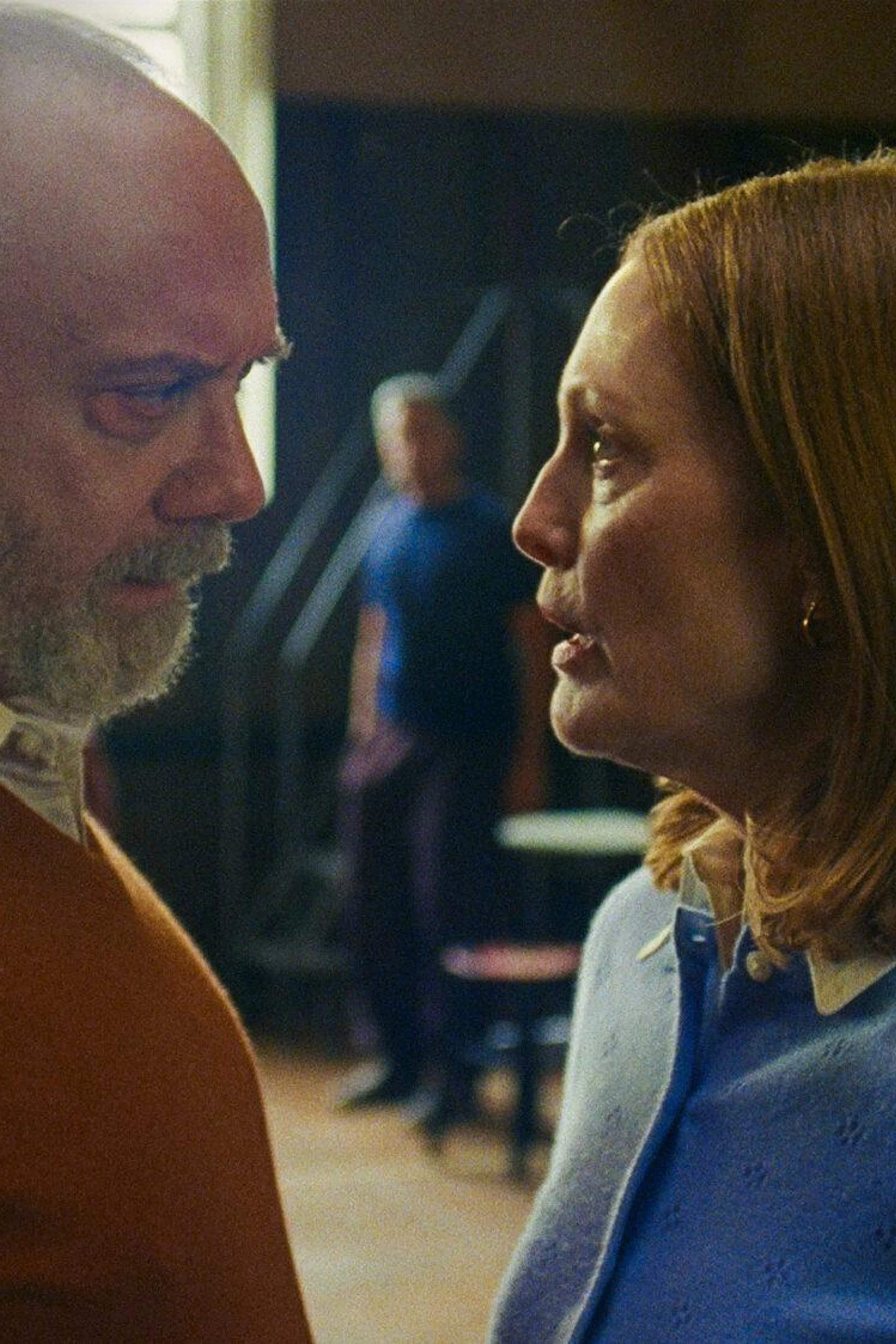 Paul Giamatti as Jerry and Julianne Moore as Mona face each other in a portrait still from The Debut.
