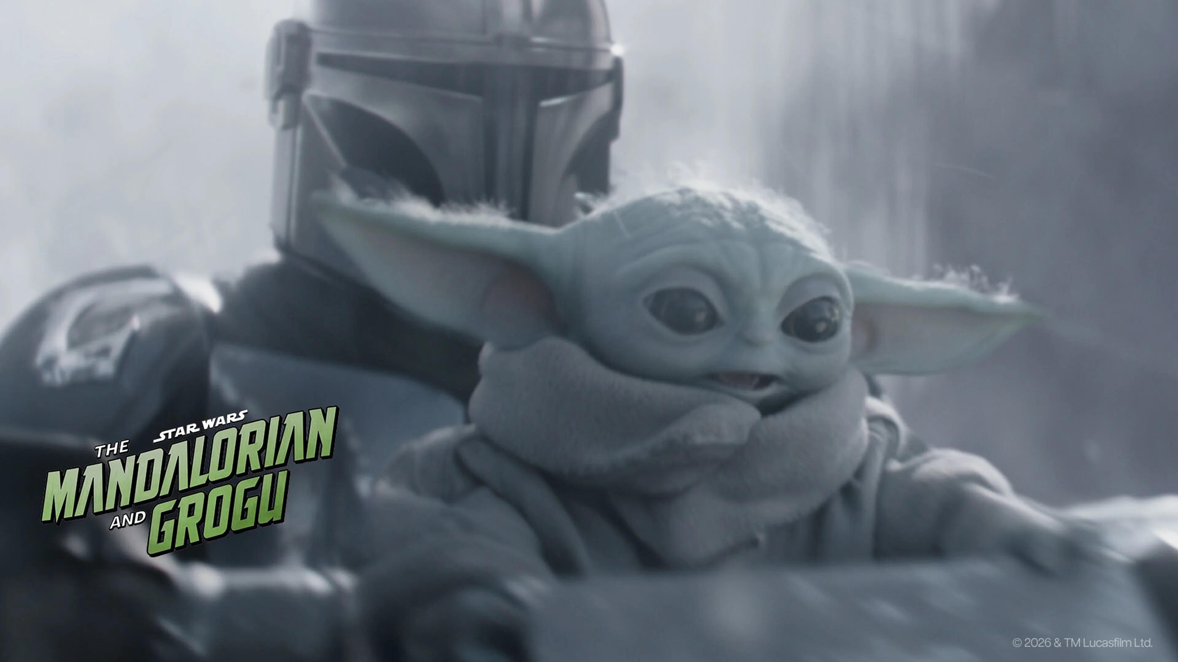 Grogu looks toward the camera while sitting in a vehicle in Star Wars: The Mandalorian and Grogu.