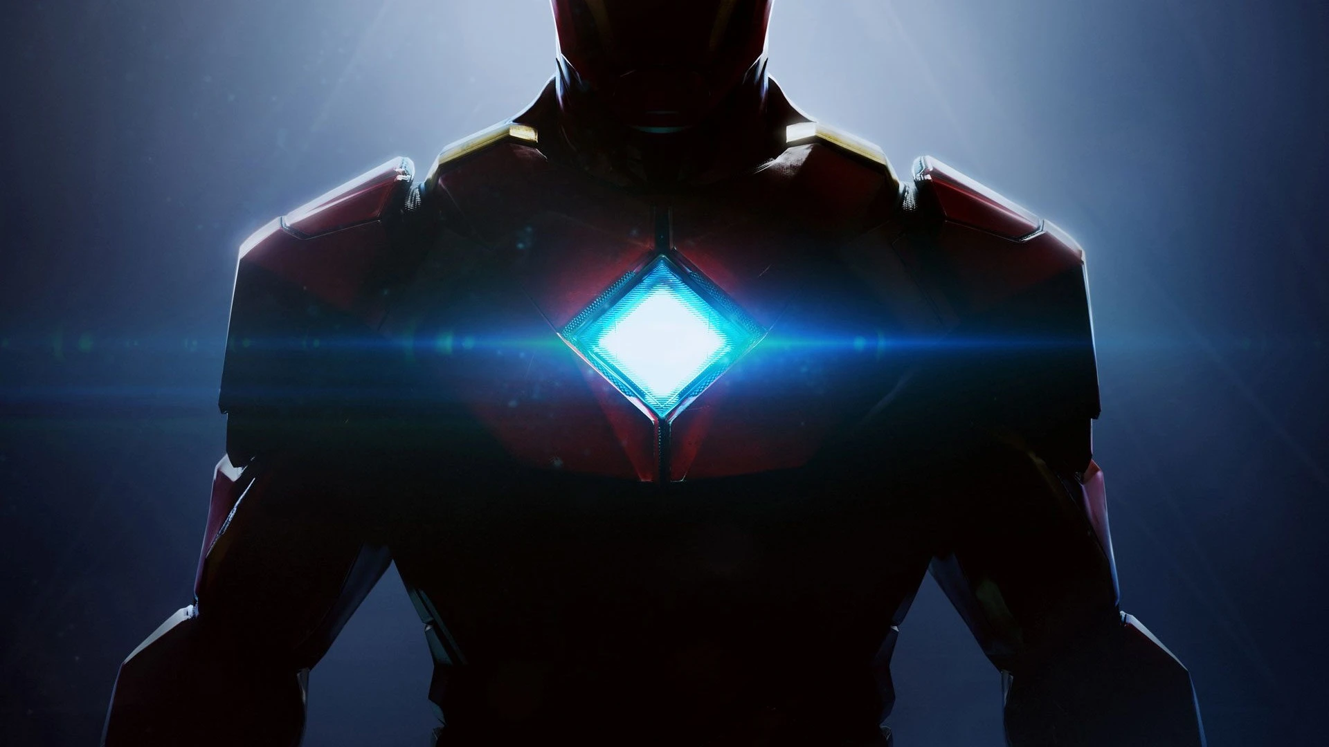 Iron Man armor stands against a blue background in official Electronic Arts and Motive Studio art.
