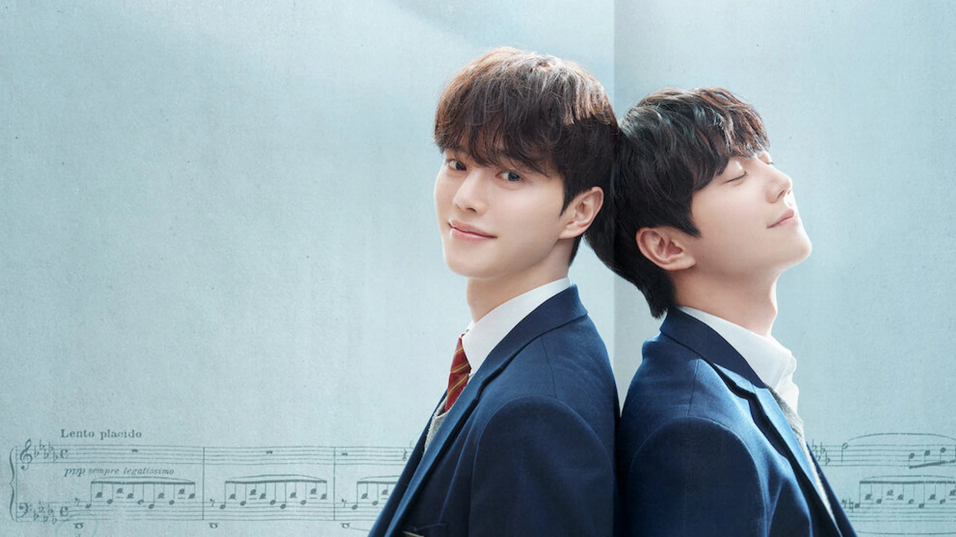 Song Kang and Lee Jun-young stand back to back in Four Hands, Two Sonatas.