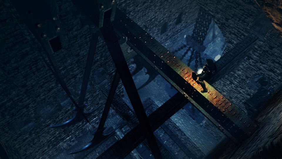 An adventurer stands on a narrow elevated walkway between dark stone structures.
