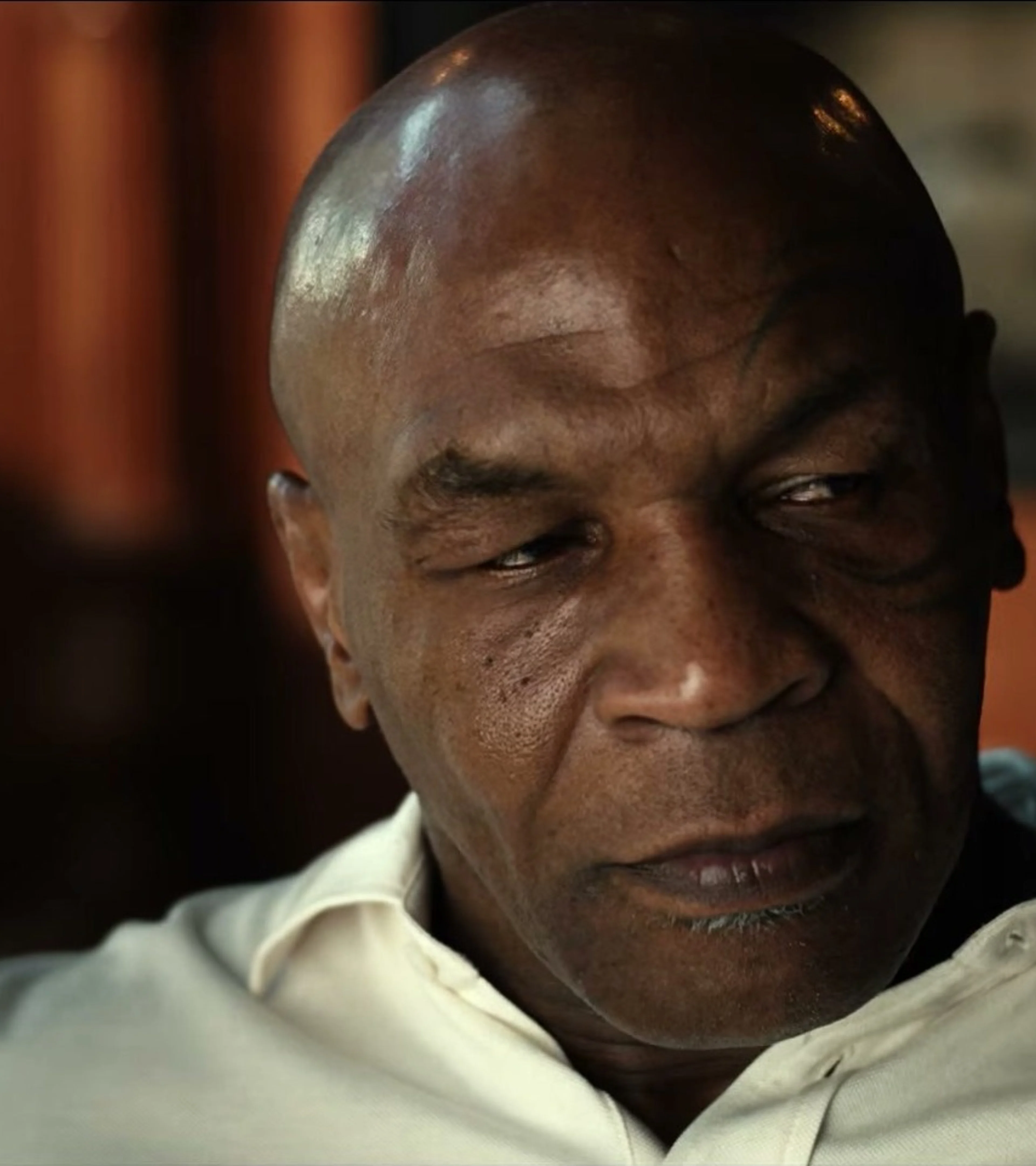 Mike Tyson looks toward the camera in the TYSON documentary trailer.
