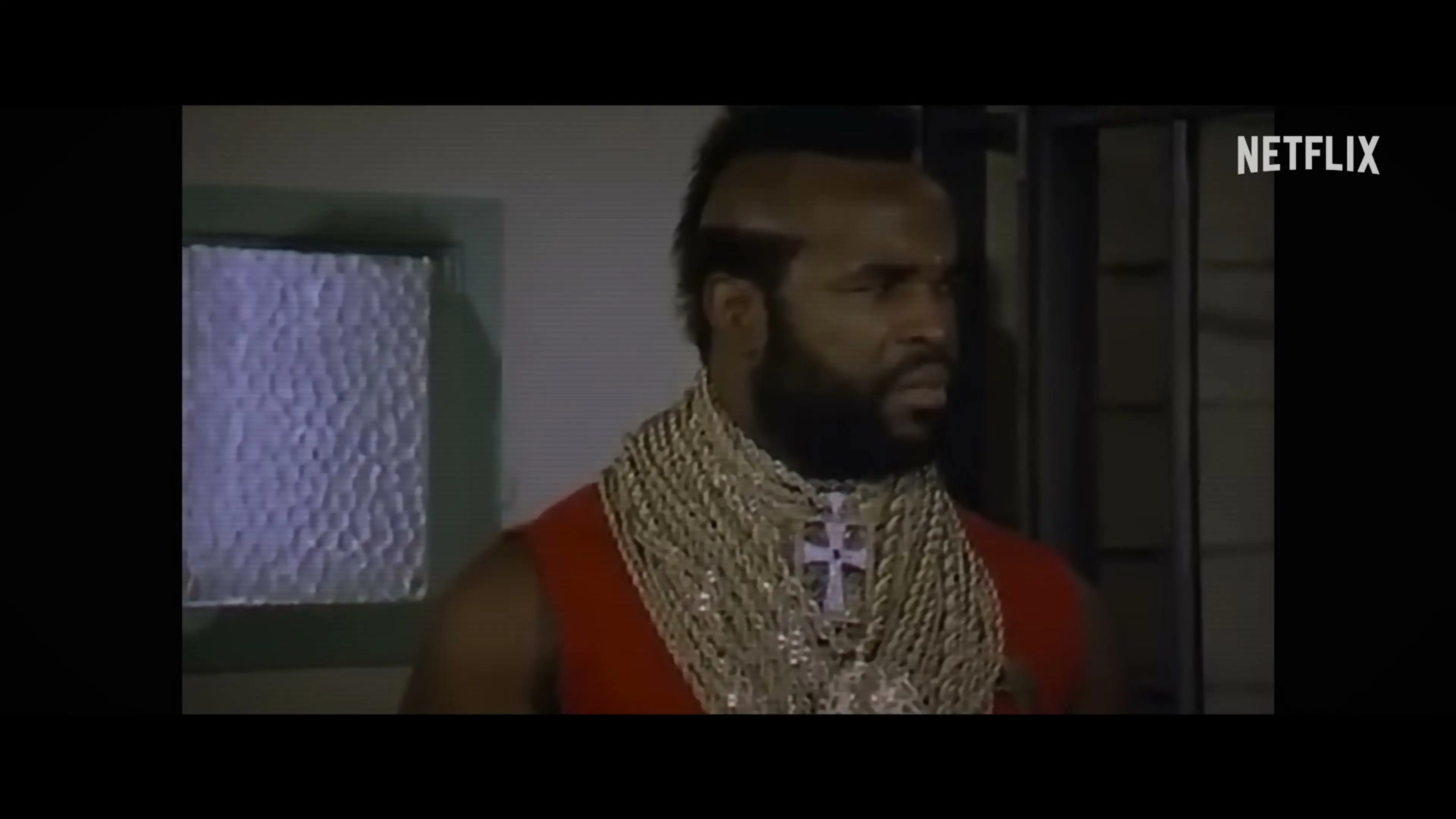 Mr. T wears gold chains in archival wrestling footage shown in Untold Mr. T: I Pity The Fool.