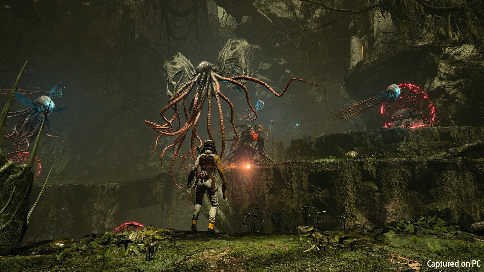Selene approaches a large hostile creature on Atropos.