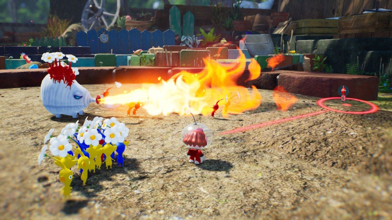 An explorer commands Pikmin against a creature that breathes fire.